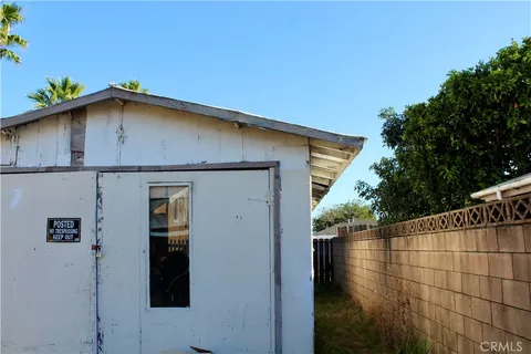 a house with trees in front of it