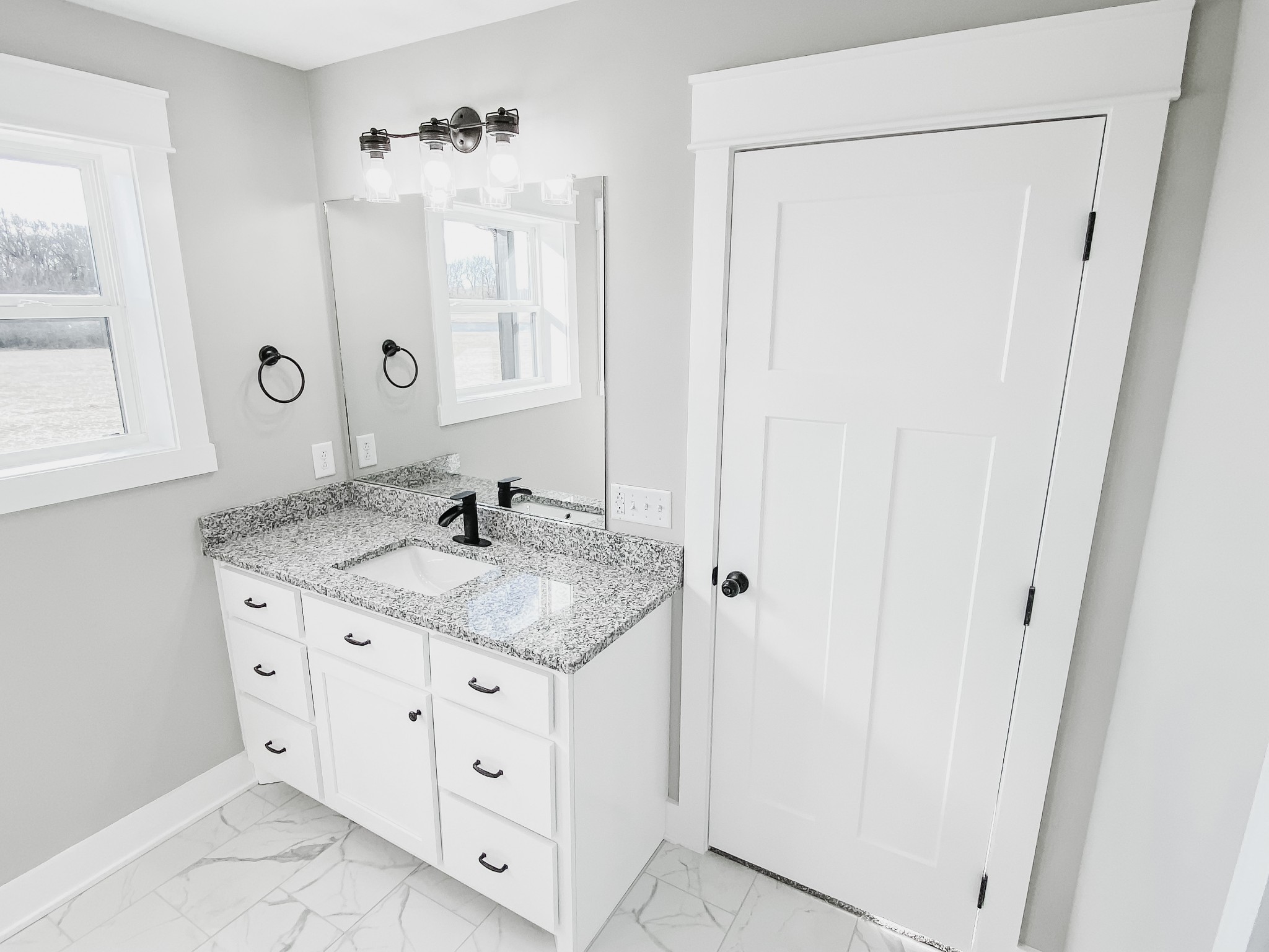 4184 Oregon Road Springfield, TN 37172 - Photo 32 of 33 a bathroom with a granite countertop sink and a mirror