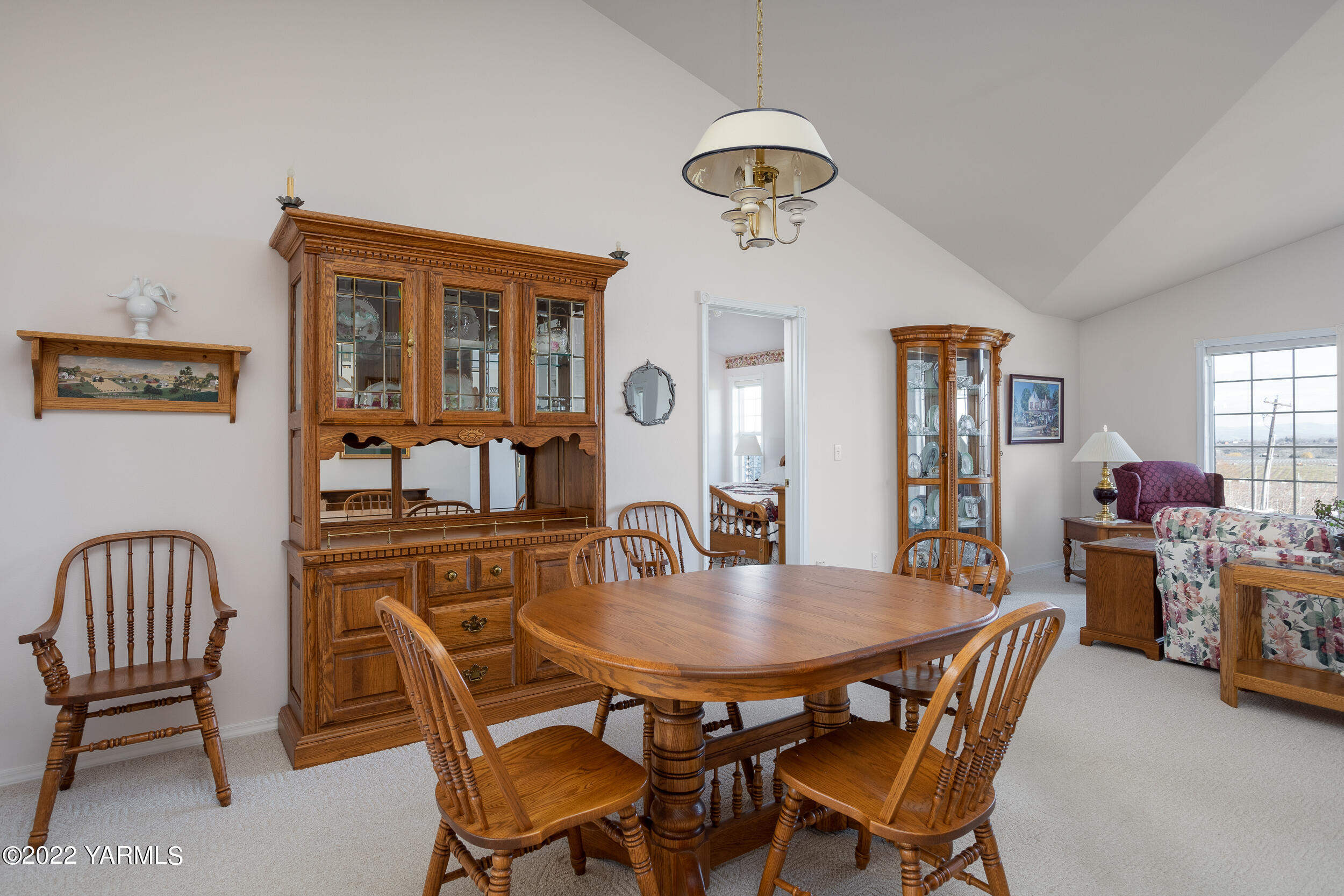 200 Nash Road Tieton, WA 98947 - Photo 10 of 29 a dining room with furniture a chandelier and window