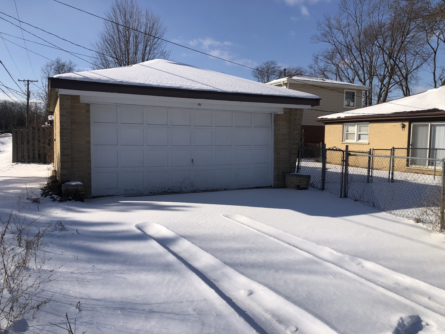 3851 153rd Place Midlothian, IL 60445 - Photo 12 of 13 a front view of a house with a garage