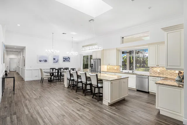 a living room with furniture fireplace and window
