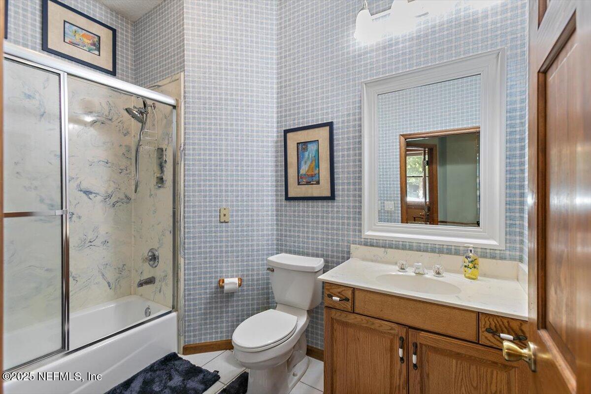 85232 Amanda Court Yulee, FL 32097 - Photo 18 of 42 a bathroom with a sink toilet and shower