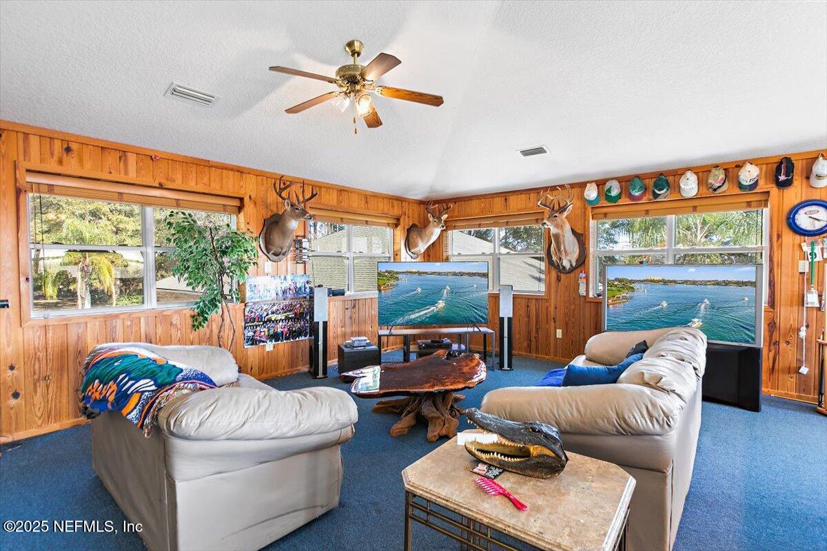 85232 Amanda Court Yulee, FL 32097 - Photo 29 of 42 a living room with furniture and a large window