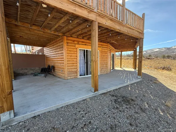 a view of a balcony with wooden floor