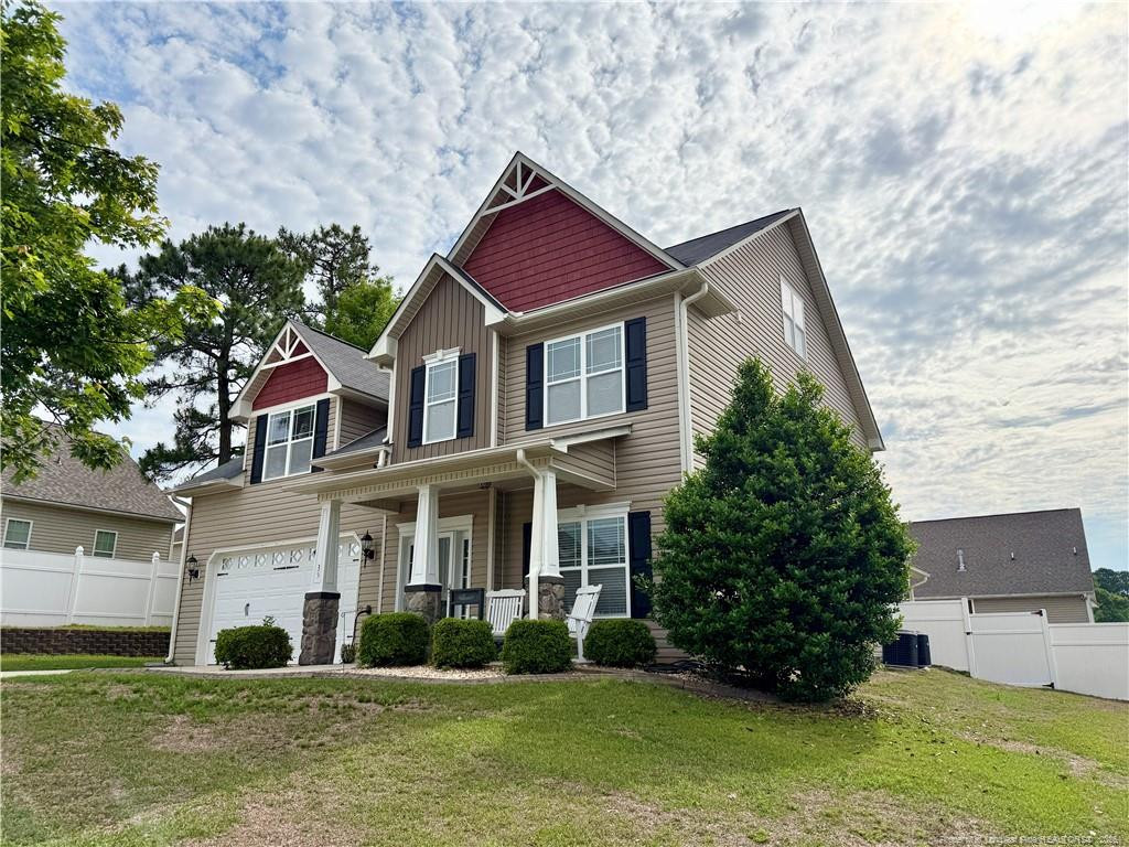 35 Ambrose Point Cameron, NC 28326 - Photo 3 of 31 a front view of a house with a yard