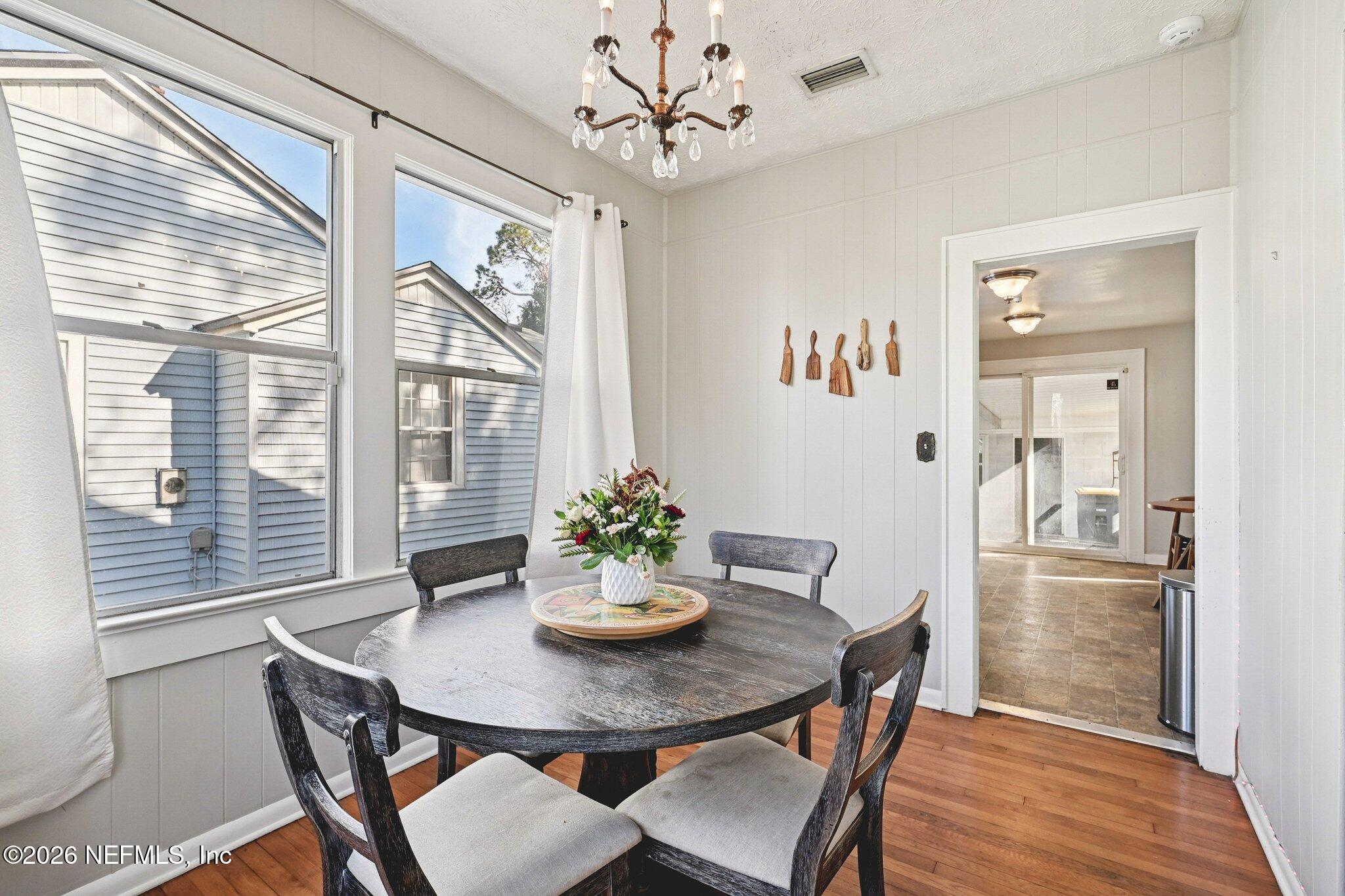 1021 Old Hickory Road Jacksonville, FL 32207 - Photo 14 of 42 a view of a dining room with furniture window and outside view