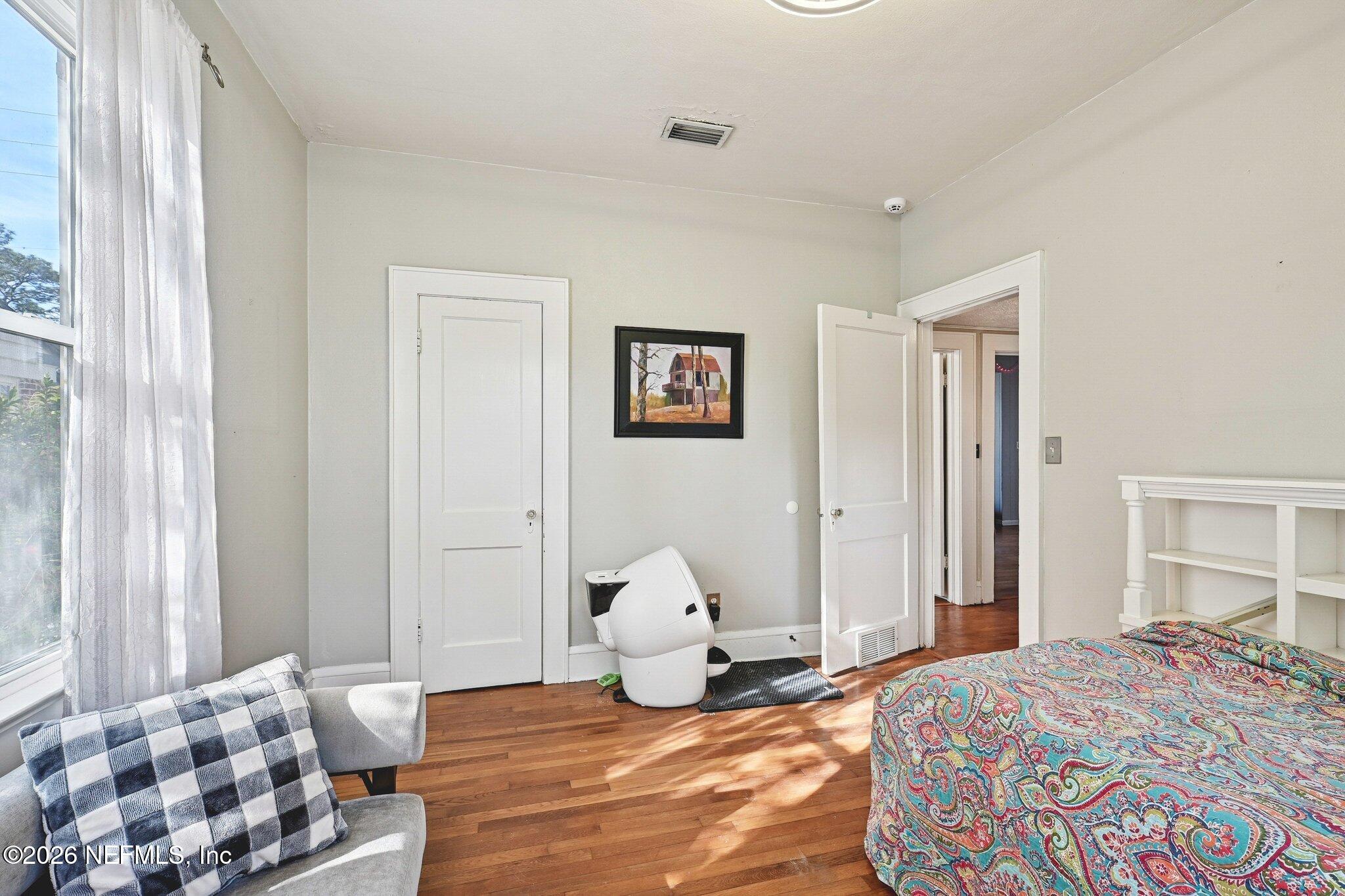 1021 Old Hickory Road Jacksonville, FL 32207 - Photo 24 of 42 a bedroom with a bed and a window