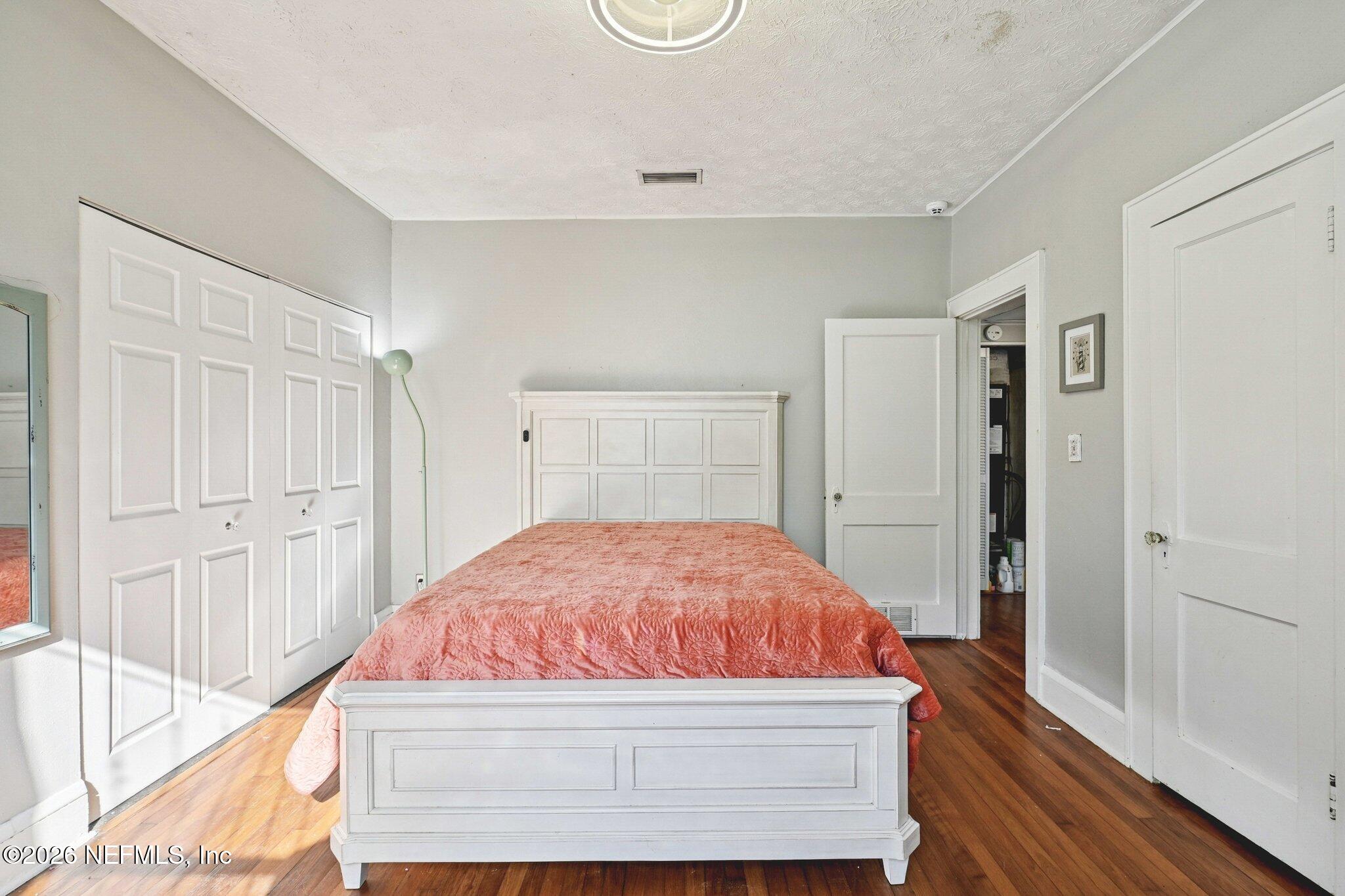 1021 Old Hickory Road Jacksonville, FL 32207 - Photo 26 of 42 a room with a bed and a walk in closet