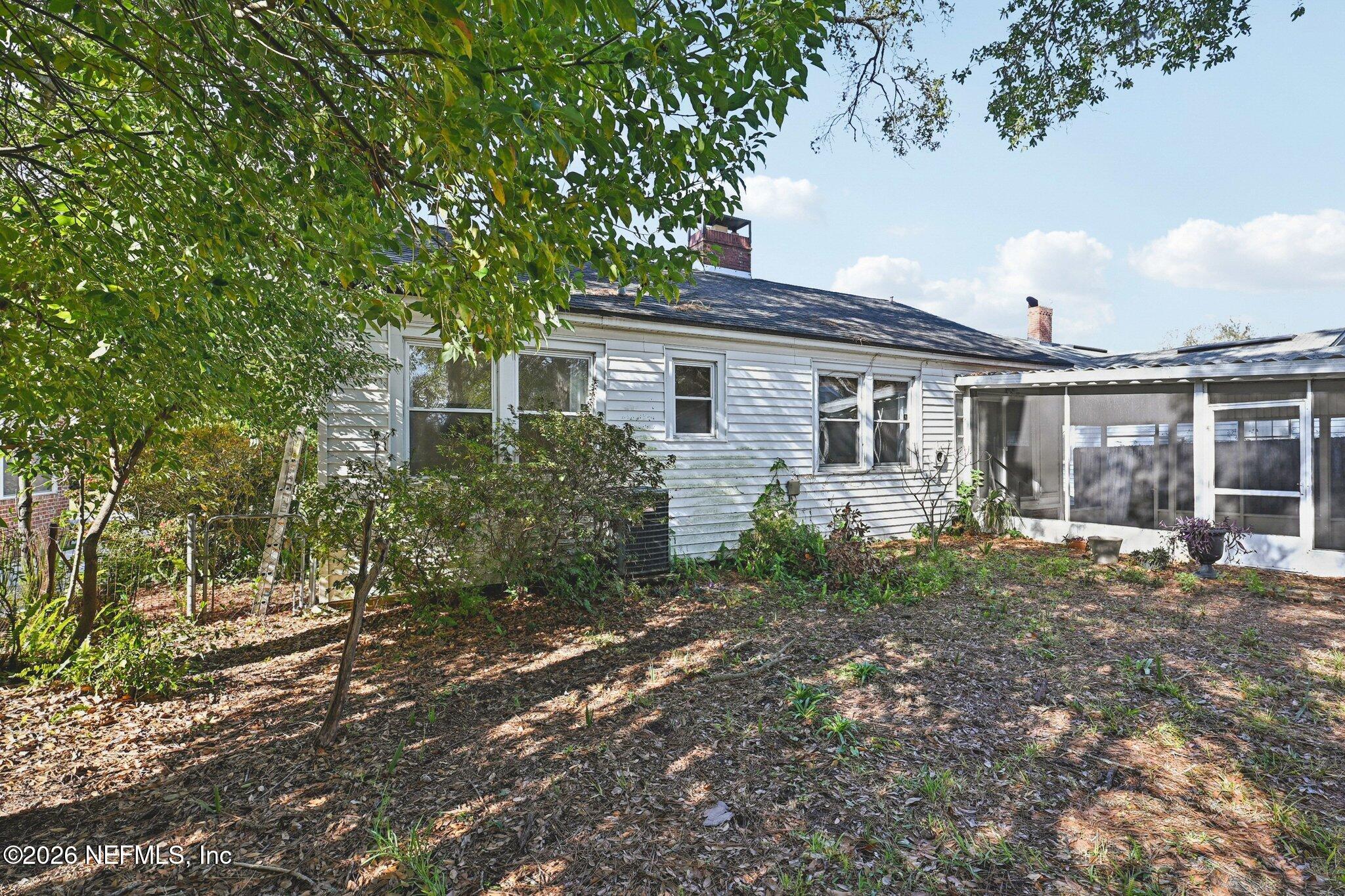 1021 Old Hickory Road Jacksonville, FL 32207 - Photo 34 of 42 a house that has a tree in front of it