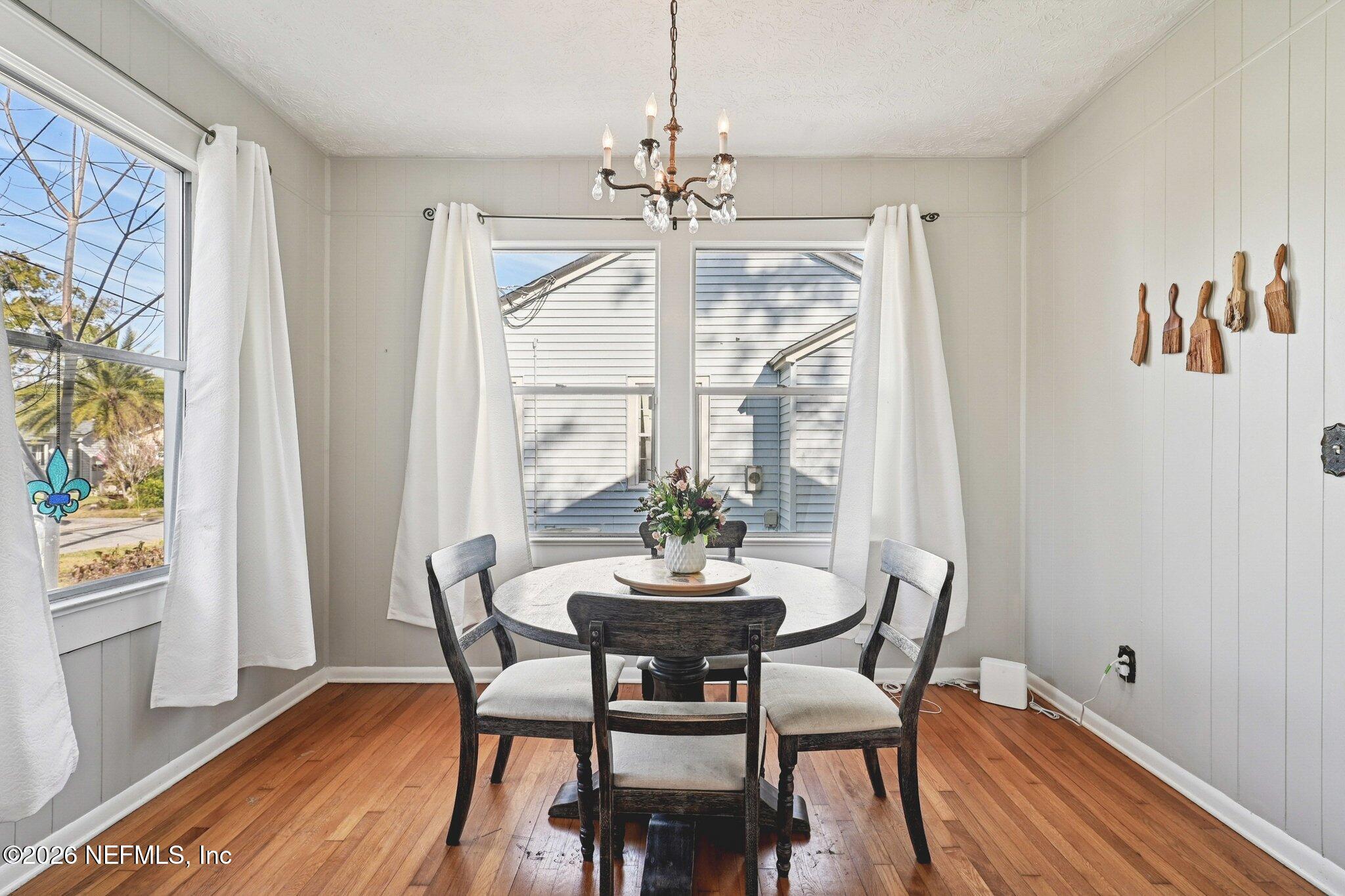 1021 Old Hickory Road Jacksonville, FL 32207 - Photo 4 of 42 a view of a dining room with furniture window and wooden floor