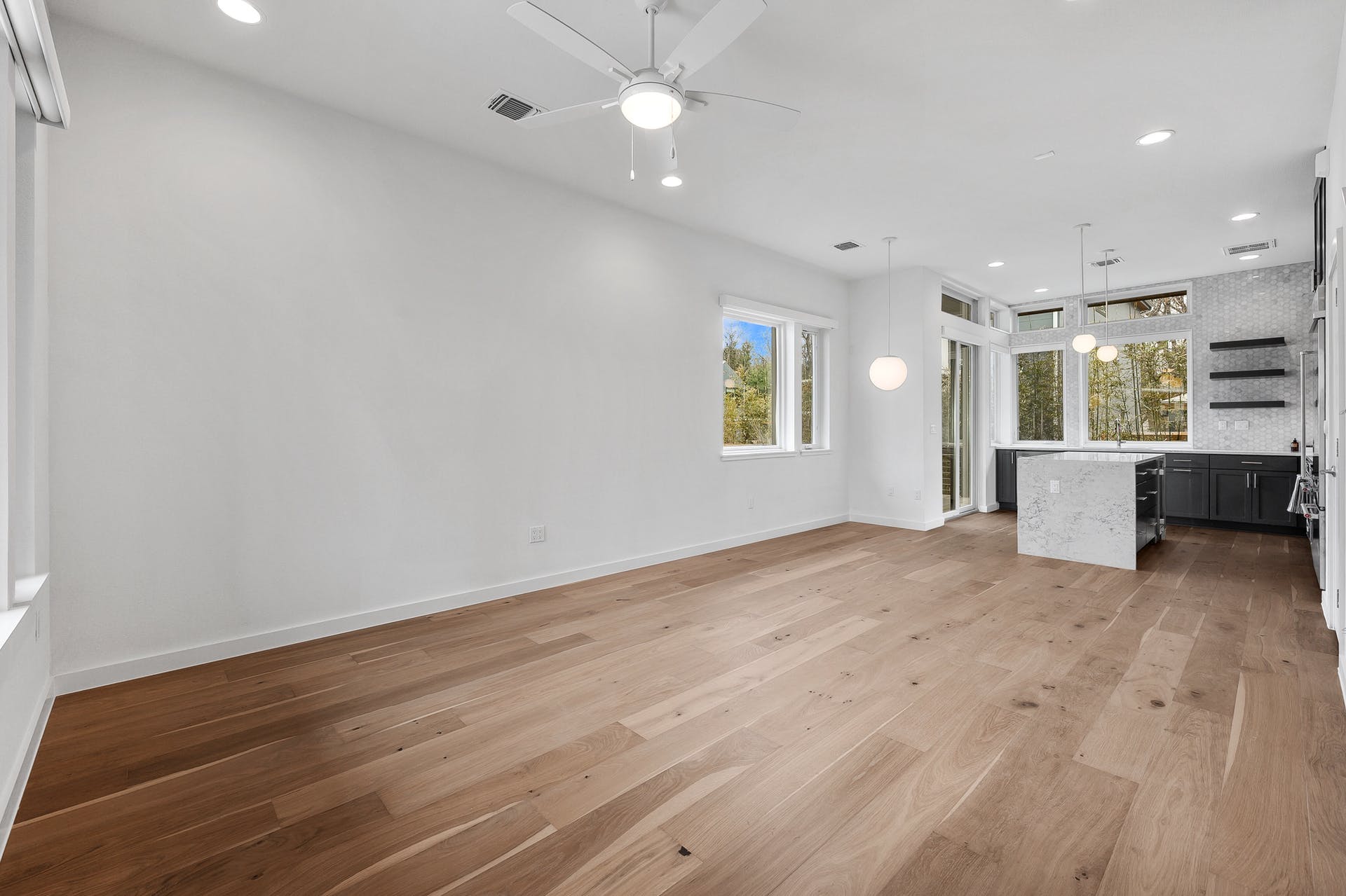 900 South 2nd Street, Unit 15 Austin, TX 78704 - Photo 12 of 31 a view of an empty room with a window and fireplace
