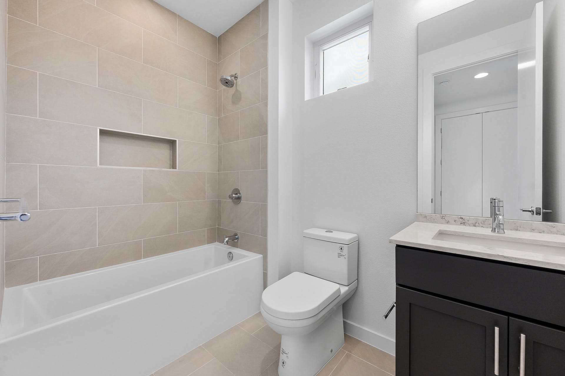 900 South 2nd Street, Unit 15 Austin, TX 78704 - Photo 20 of 31 a bathroom with a sink a toilet and shower