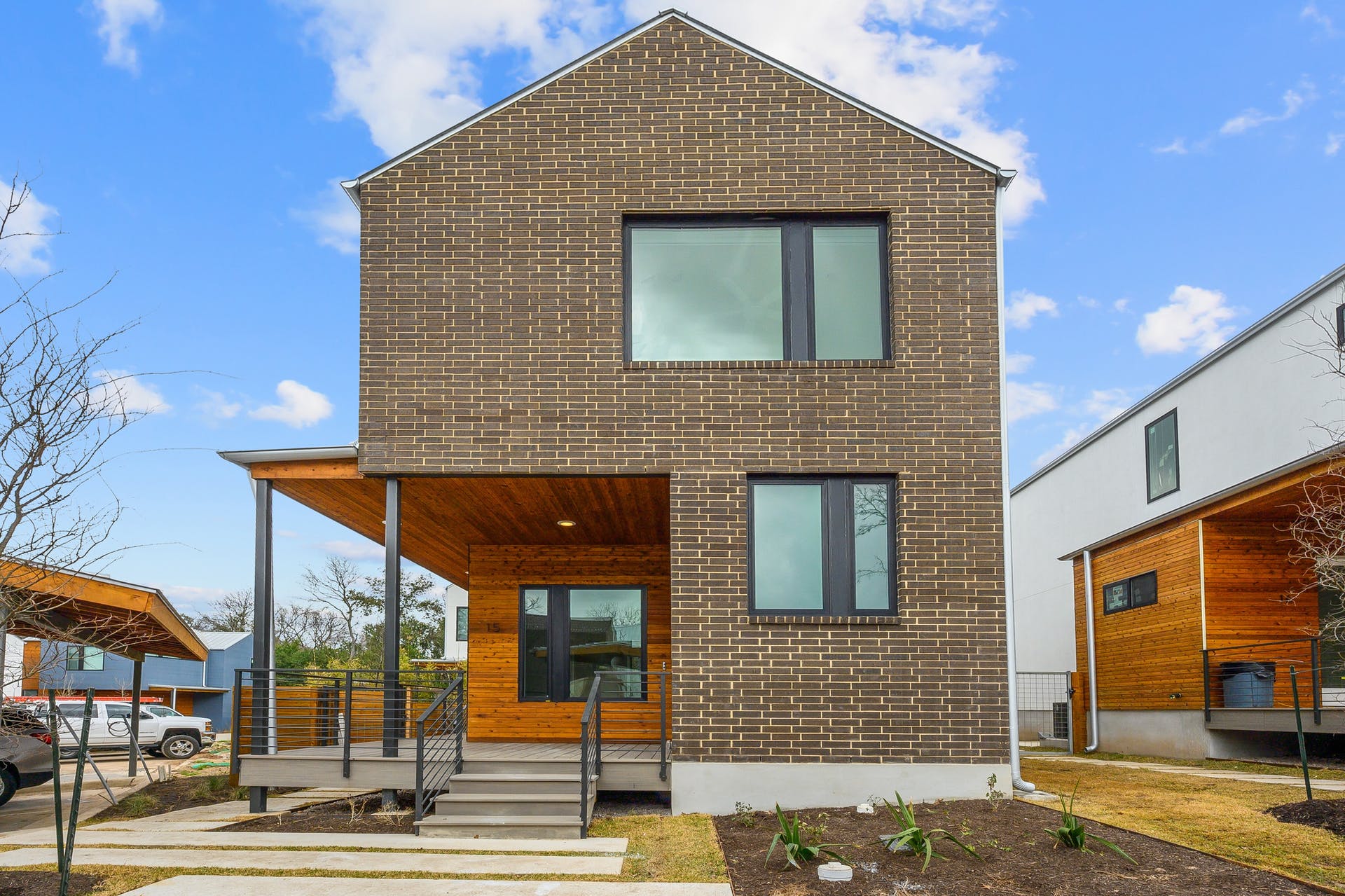 900 South 2nd Street, Unit 15 Austin, TX 78704 - Photo 2 of 31 a front view of a house with a yard