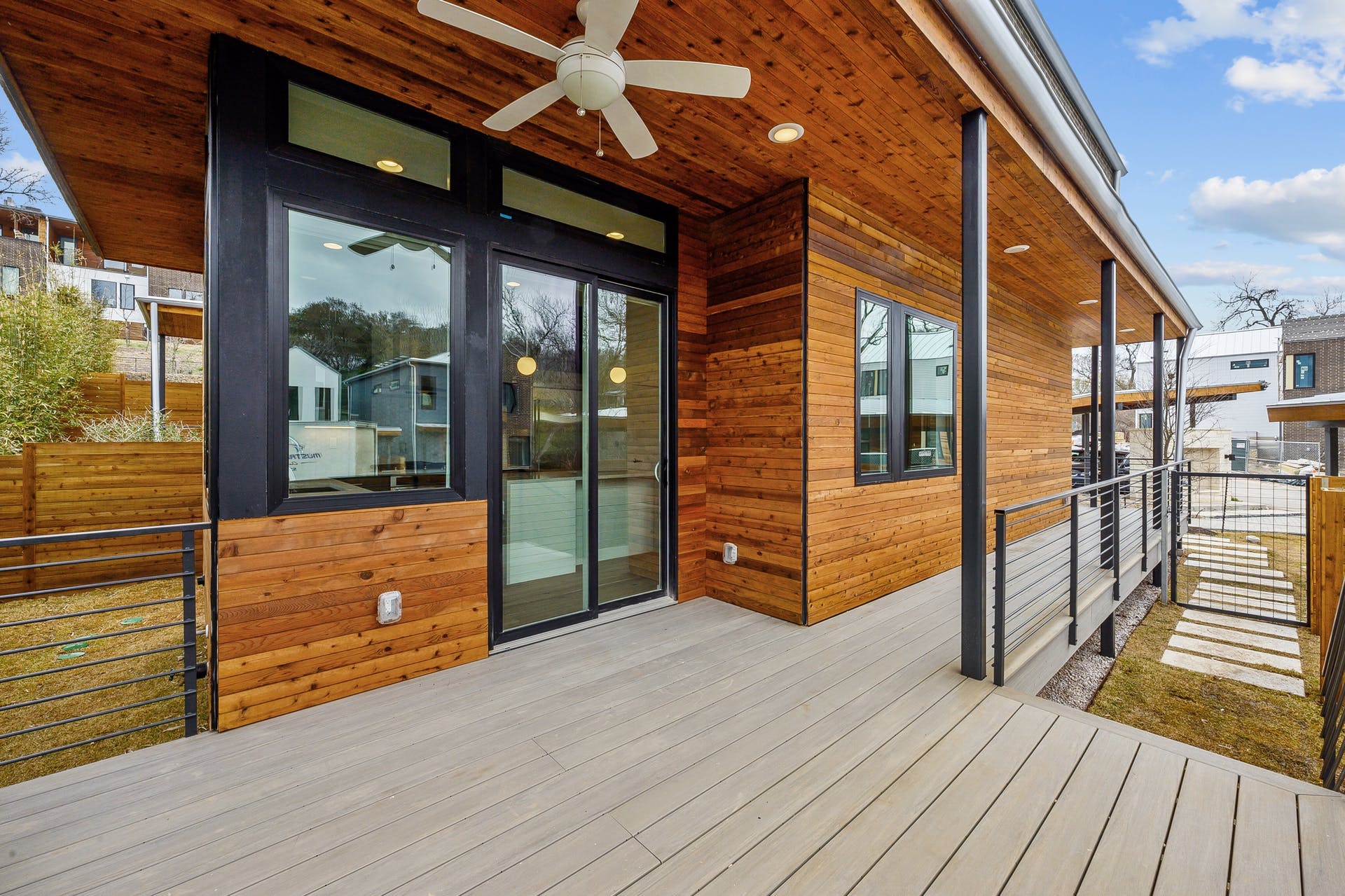 900 South 2nd Street, Unit 15 Austin, TX 78704 - Photo 24 of 31 a view of porch with wooden floor and iron stairs