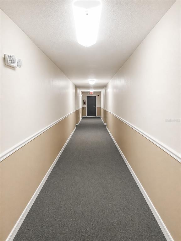 1695 Lee Road, Unit C206 Winter Park, FL 32789 - Photo 2 of 18 a view of a hallway