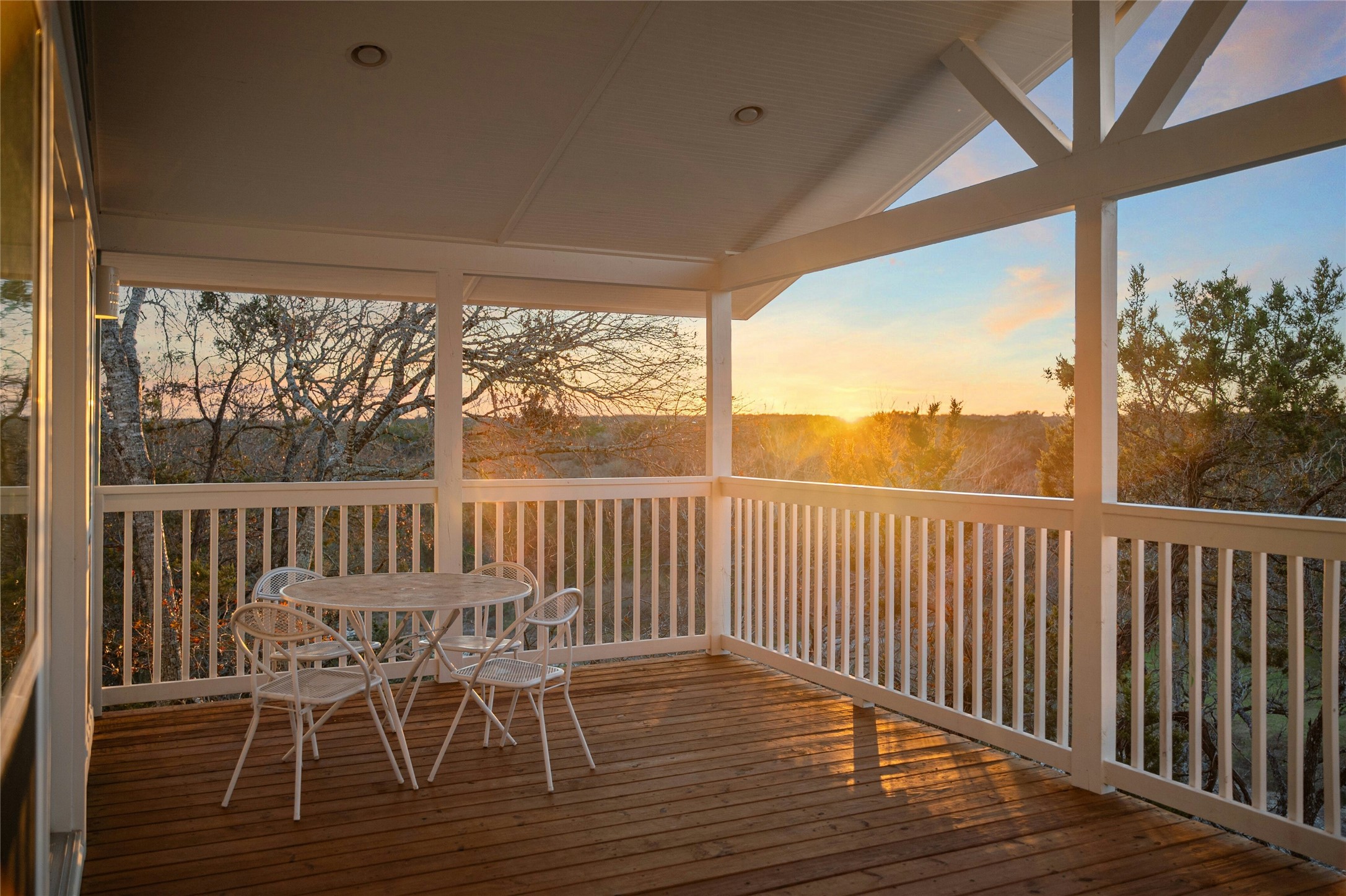 550 Cliffside Road Wimberley, TX 78676 - Photo 28 of 35 a view of a wooden chairs on the roof deck