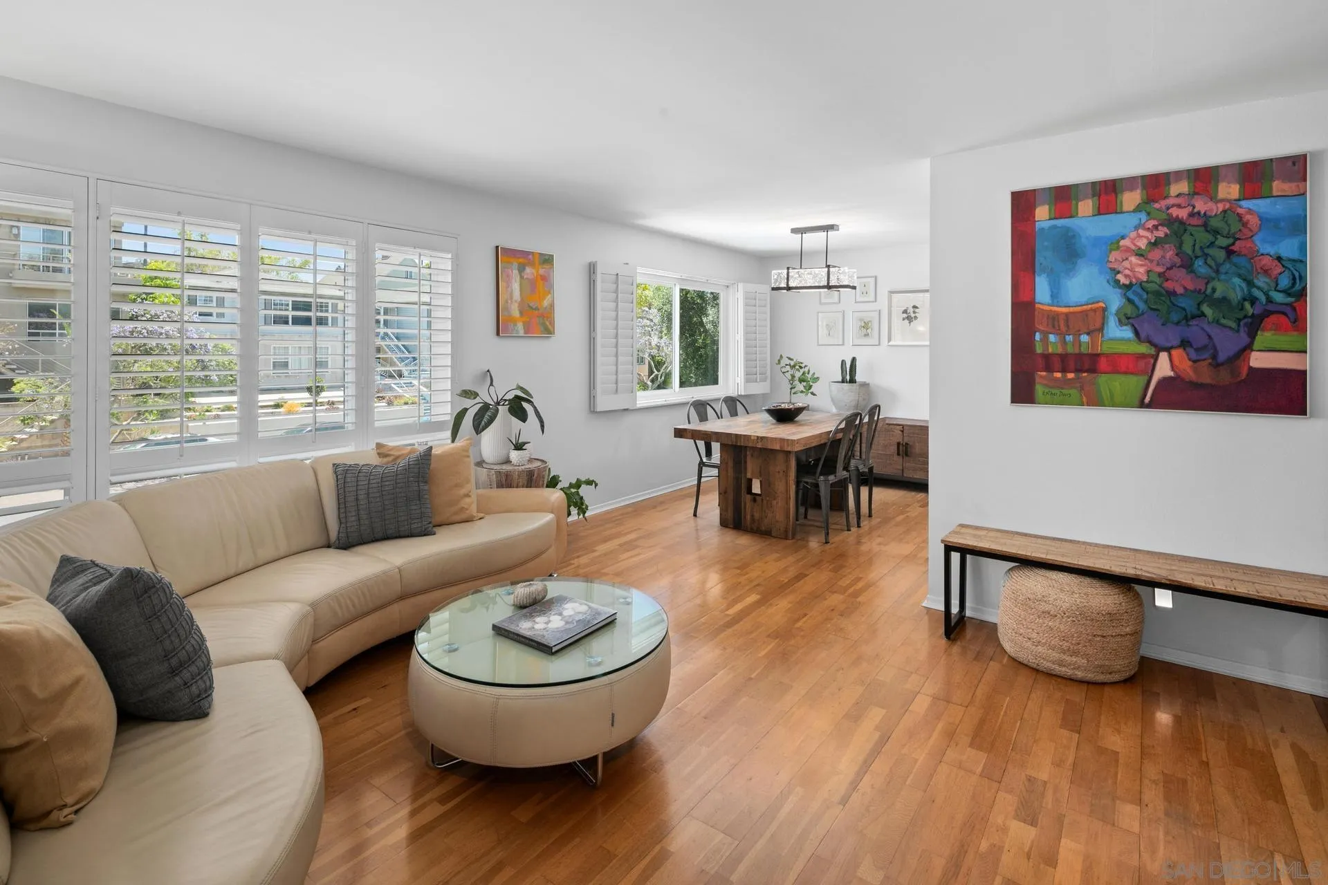 3266 1st Avenue, Unit 20 San Diego, CA 92103 - Photo 1 of 37 a living room with furniture and a wooden floor