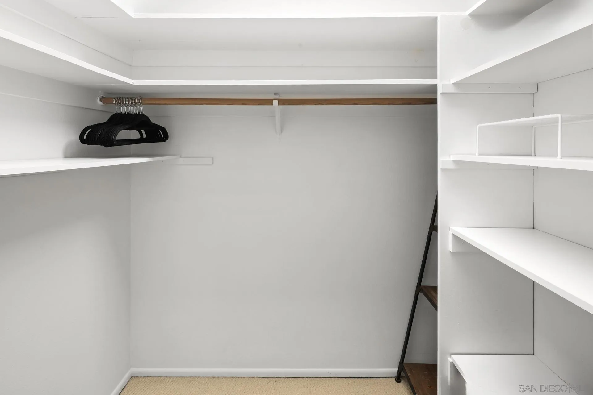 3266 1st Avenue, Unit 20 San Diego, CA 92103 - Photo 16 of 37 a view of an empty walk in closet