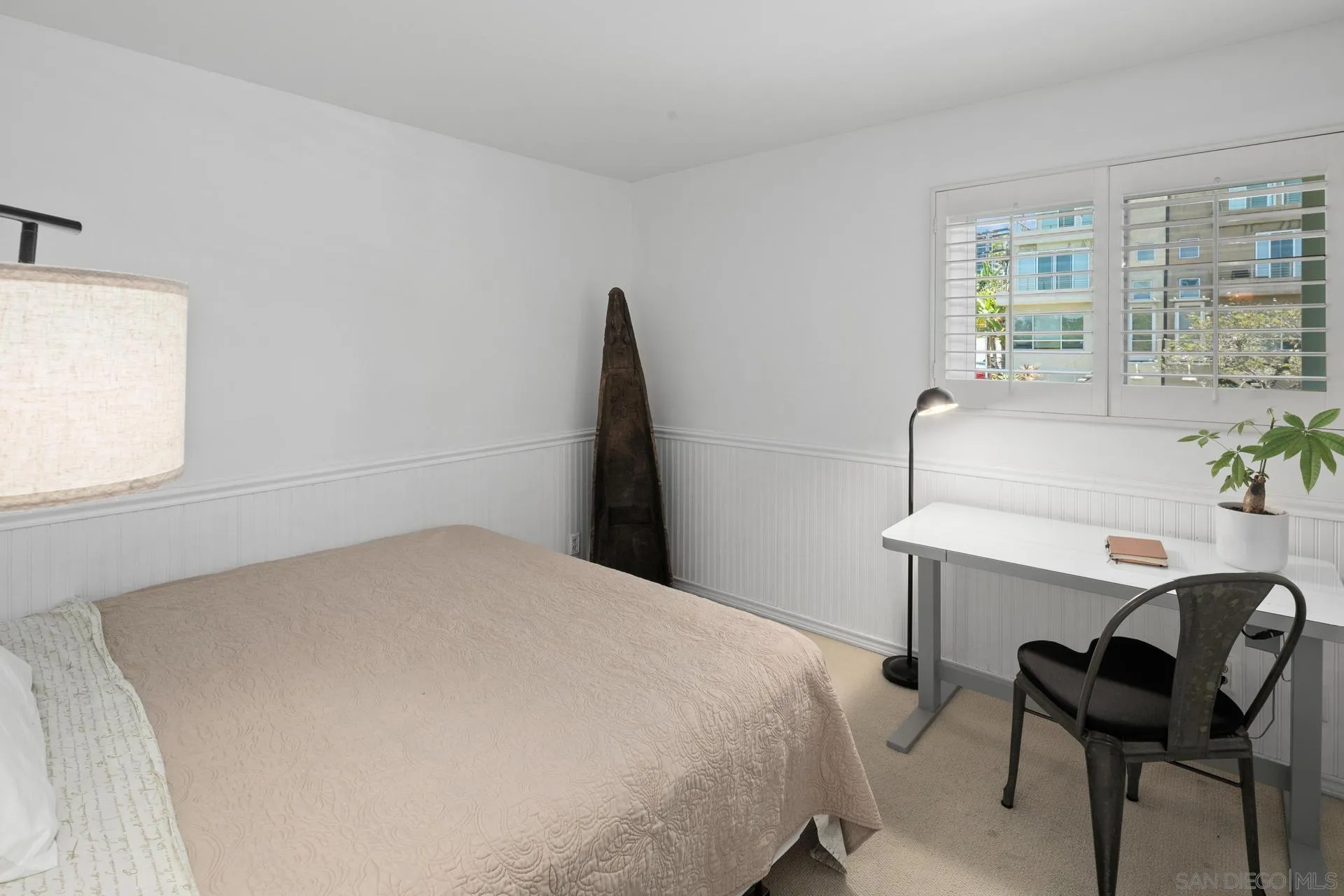 3266 1st Avenue, Unit 20 San Diego, CA 92103 - Photo 18 of 37 a bedroom with a bed and a chair