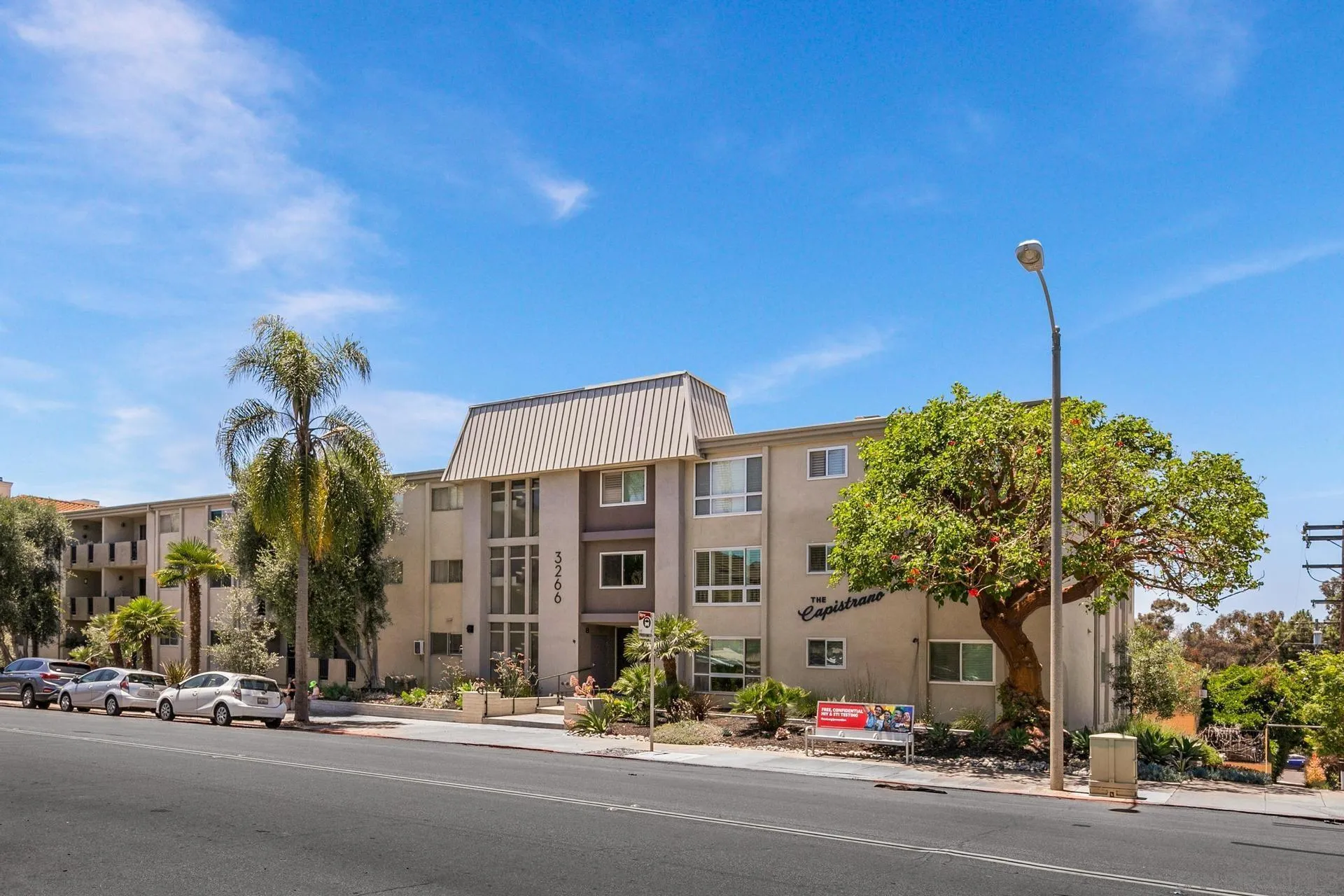 3266 1st Avenue, Unit 20 San Diego, CA 92103 - Photo 36 of 37 a view of a street with a building in the background