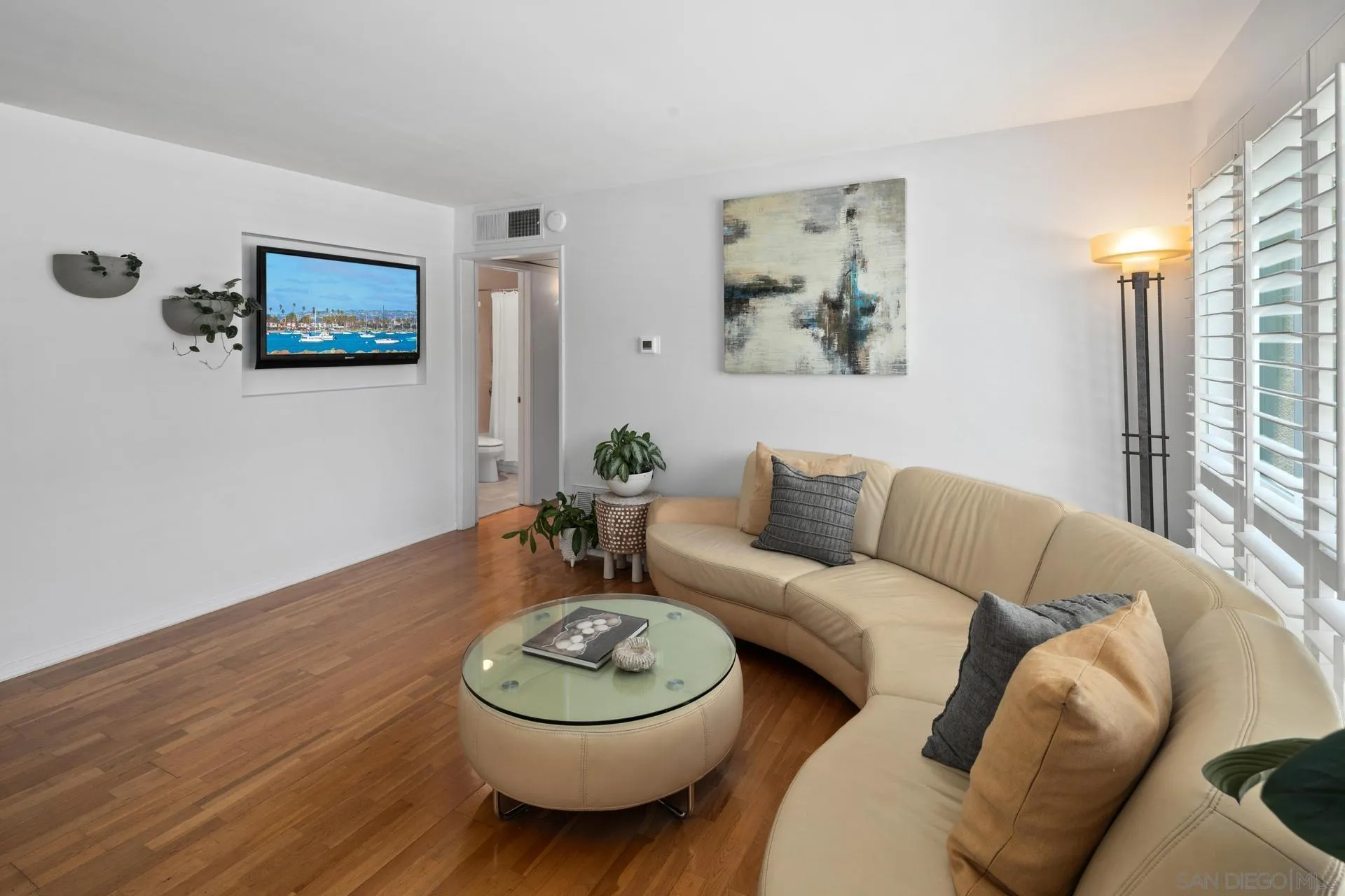 3266 1st Avenue, Unit 20 San Diego, CA 92103 - Photo 6 of 37 a living room with furniture and a wooden floor