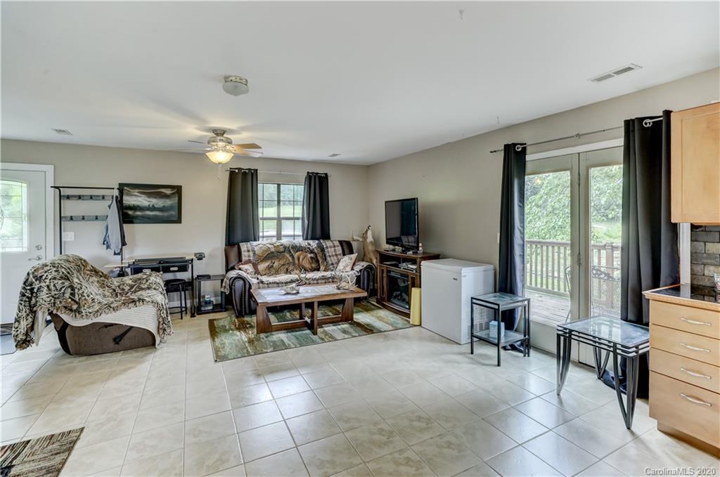 1024 Willis Farm Road Clover, SC 29710 - Photo 12 of 48 a living room with furniture and a flat screen tv