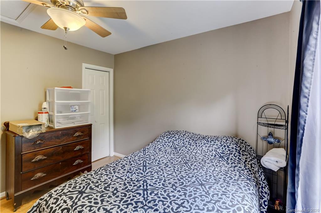 1024 Willis Farm Road Clover, SC 29710 - Photo 20 of 48 a bedroom with a bed and a dresser