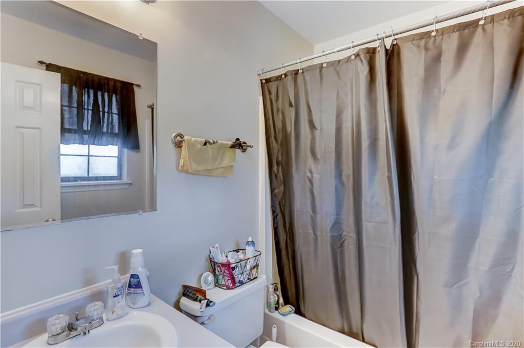1024 Willis Farm Road Clover, SC 29710 - Photo 25 of 48 a bathroom with a bathtub and shower