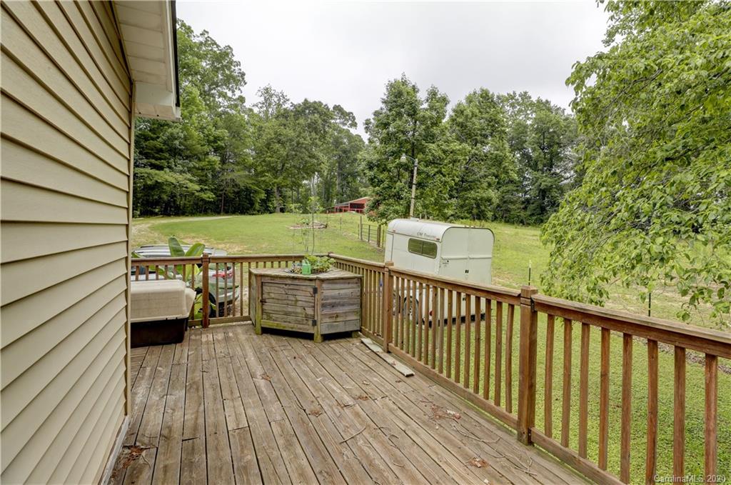 1024 Willis Farm Road Clover, SC 29710 - Photo 28 of 48 a view of balcony with couches and wooden floor