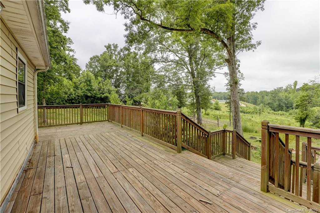 1024 Willis Farm Road Clover, SC 29710 - Photo 30 of 48 a view of balcony with wooden floor and fence