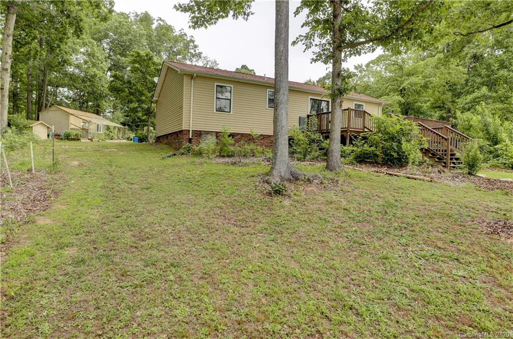 1024 Willis Farm Road Clover, SC 29710 - Photo 31 of 48 a backyard of a house with lots of green space
