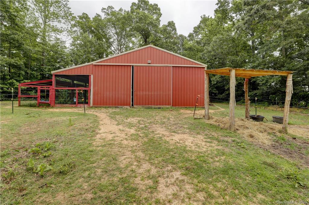 1024 Willis Farm Road Clover, SC 29710 - Photo 43 of 48 a view of a house with backyard and trees