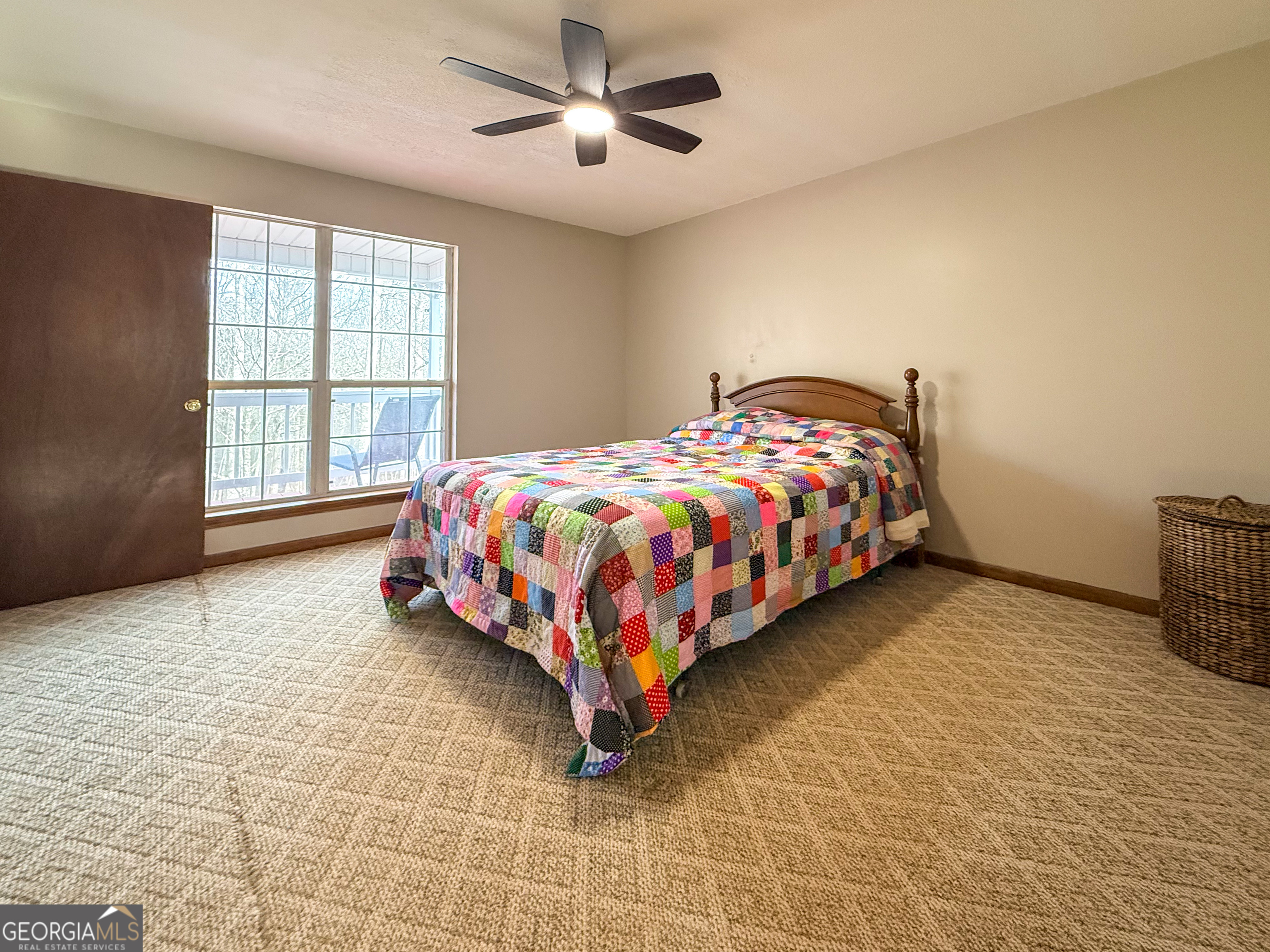 354 Prairie Flower Drive Cleveland, GA 30528 - Photo 19 of 49 a bedroom with a bed and a window