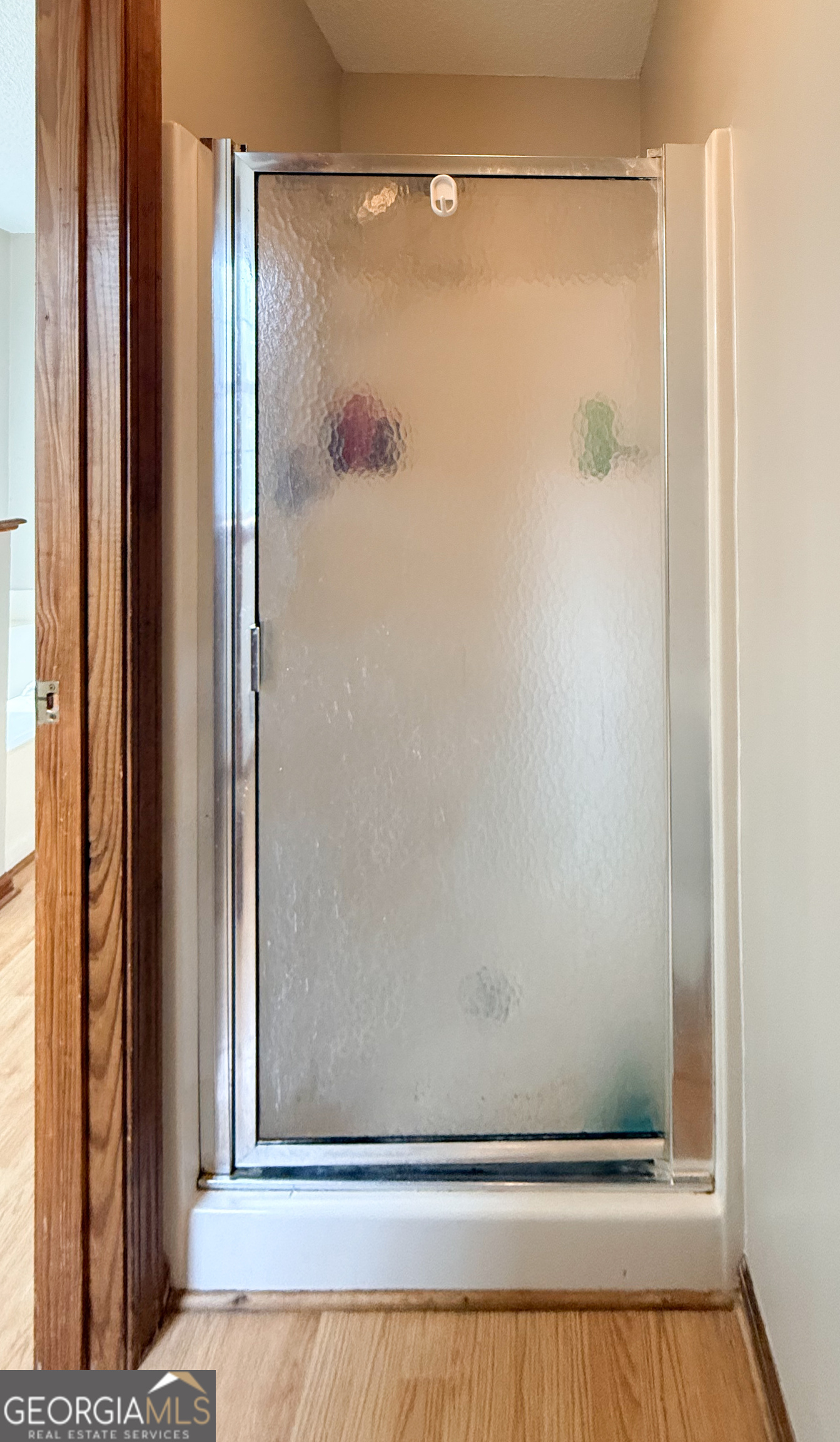 354 Prairie Flower Drive Cleveland, GA 30528 - Photo 22 of 49 a view of a bathroom with a glass door
