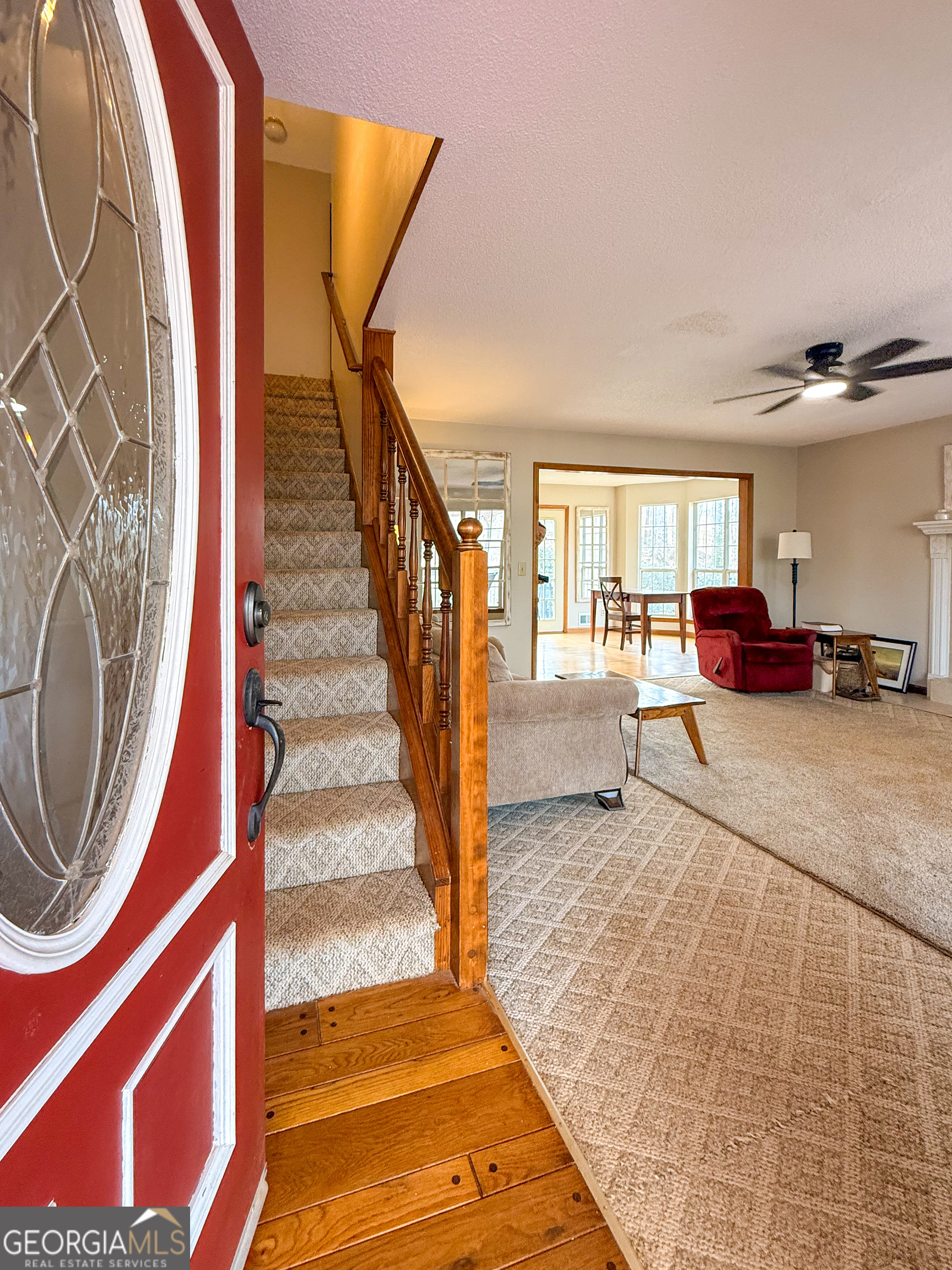 354 Prairie Flower Drive Cleveland, GA 30528 - Photo 8 of 49 a view of an entryway with wooden floor and a rug