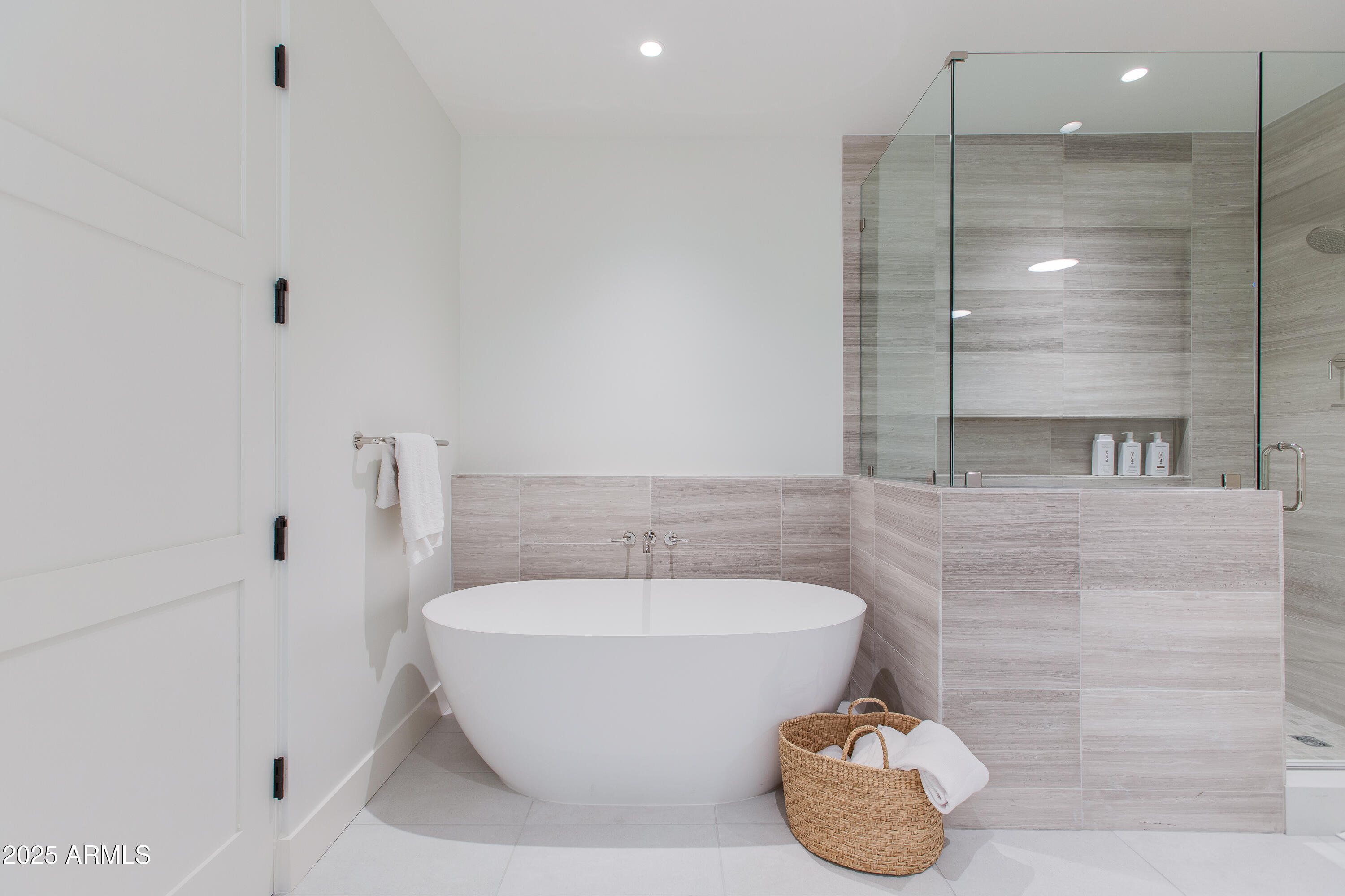 5000 North Camelback Ridge Drive, Unit 206 Scottsdale, AZ 85251 - Photo 27 of 62 a bathroom with a bathtub and shower
