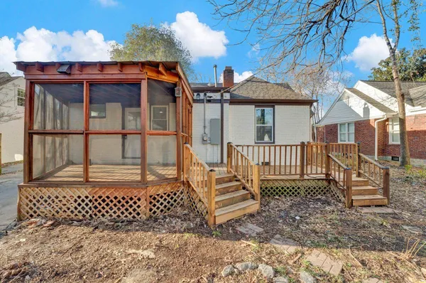 a house view with a backyard