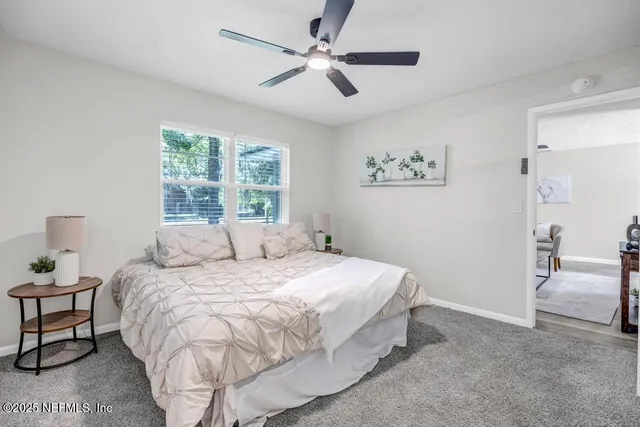 a bathroom with a toilet sink and shower