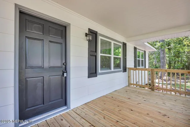 a kitchen with stainless steel appliances a refrigerator stove and microwave