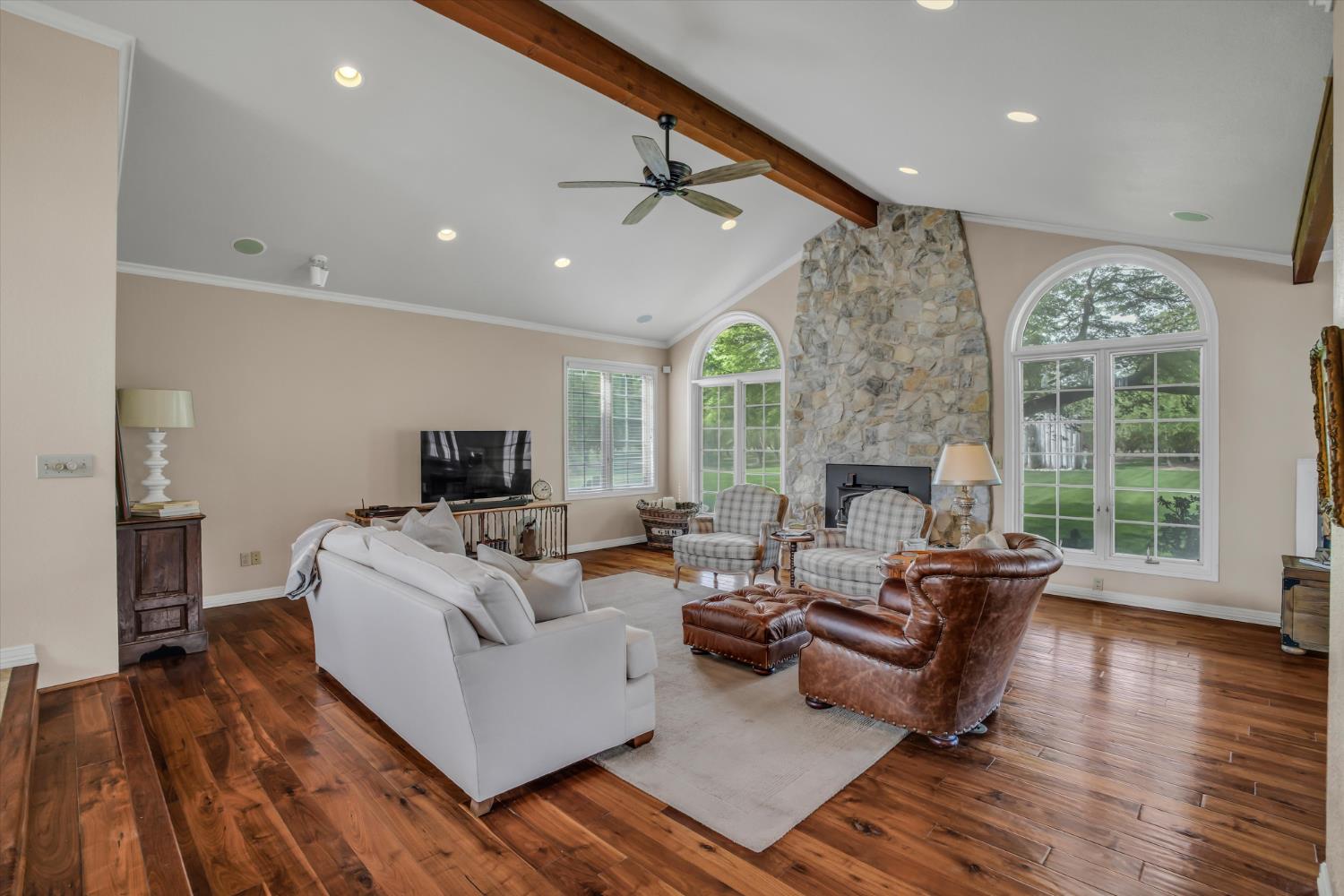 17230 Franscella Lane Ripon, CA 95366 - Photo 12 of 50 a living room with furniture and a flat screen tv