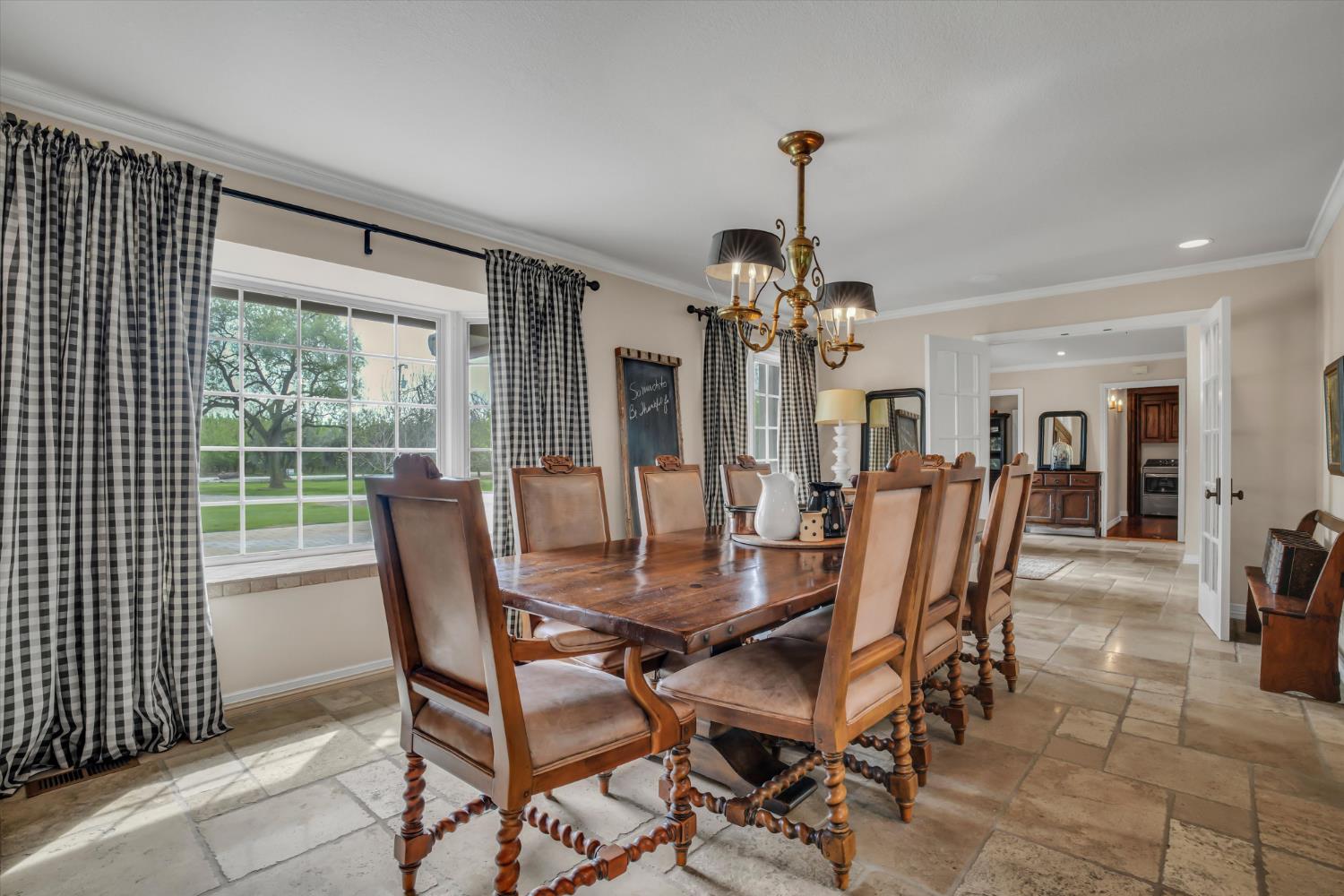 17230 Franscella Lane Ripon, CA 95366 - Photo 20 of 50 a view of a dining room with furniture window and outside view