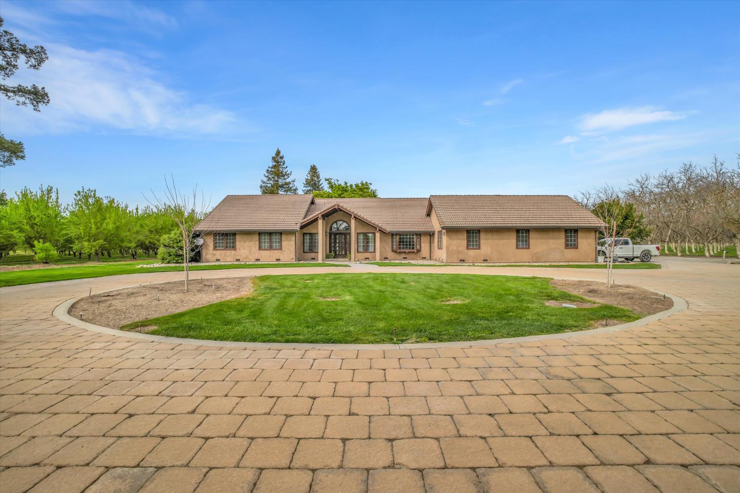 17230 Franscella Lane Ripon, CA 95366 - Photo 2 of 50 a front view of a house with a yard
