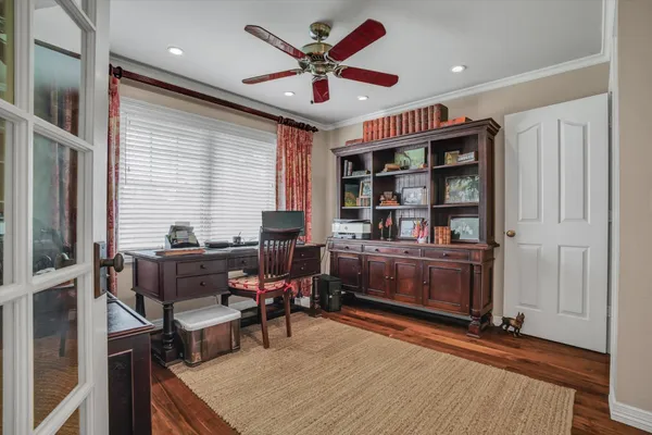 a work room with furniture and window