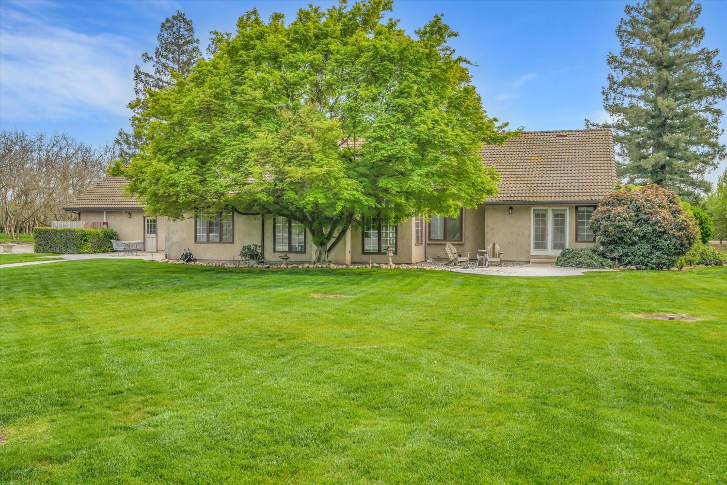 17230 Franscella Lane Ripon, CA 95366 - Photo 36 of 50 a view of house with backyard