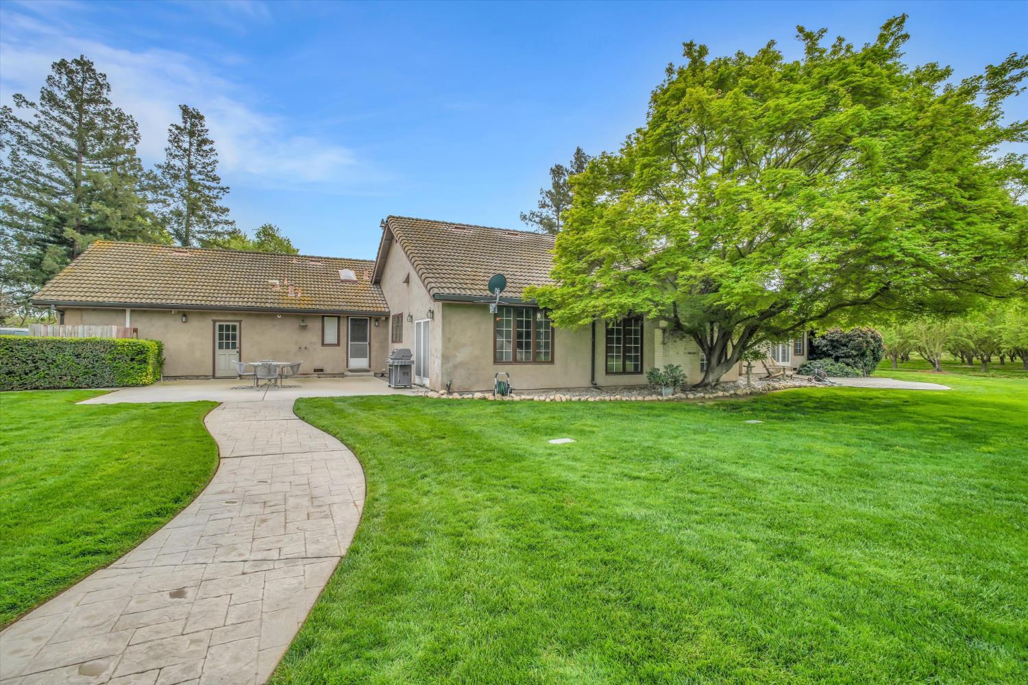 17230 Franscella Lane Ripon, CA 95366 - Photo 37 of 50 a front view of a house with a garden
