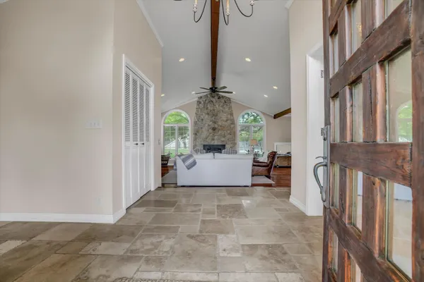 a view of an entryway with a livingroom