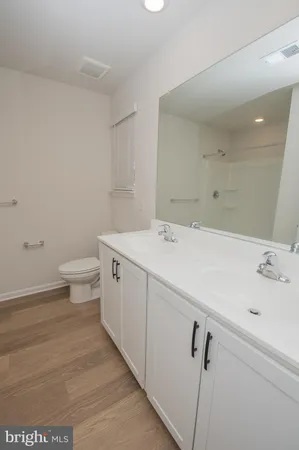 a view of a bathroom with a sink and a toilet