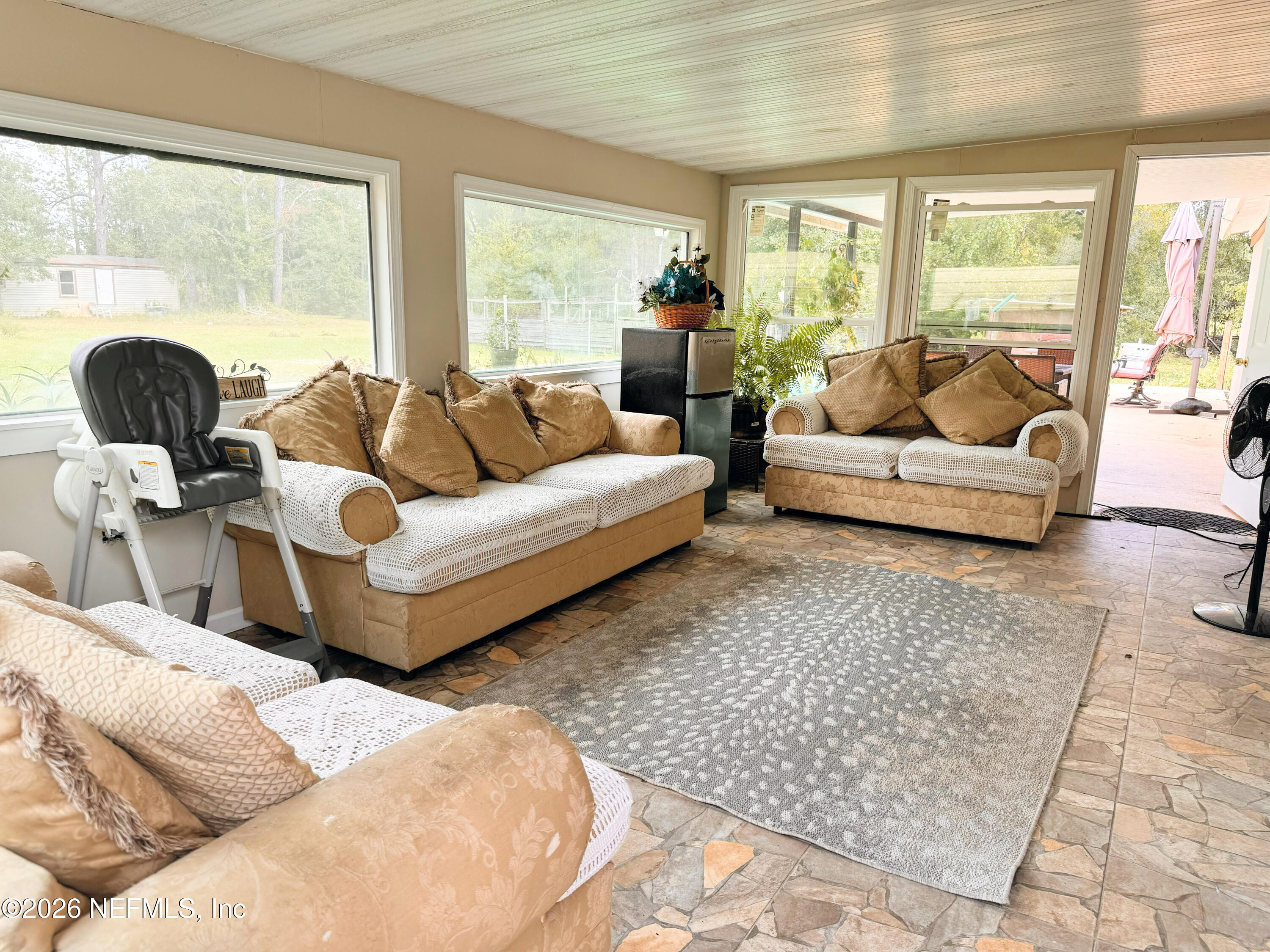 140 Keystone Road Palatka, FL 32177 - Photo 15 of 19 a living room with furniture and a large window