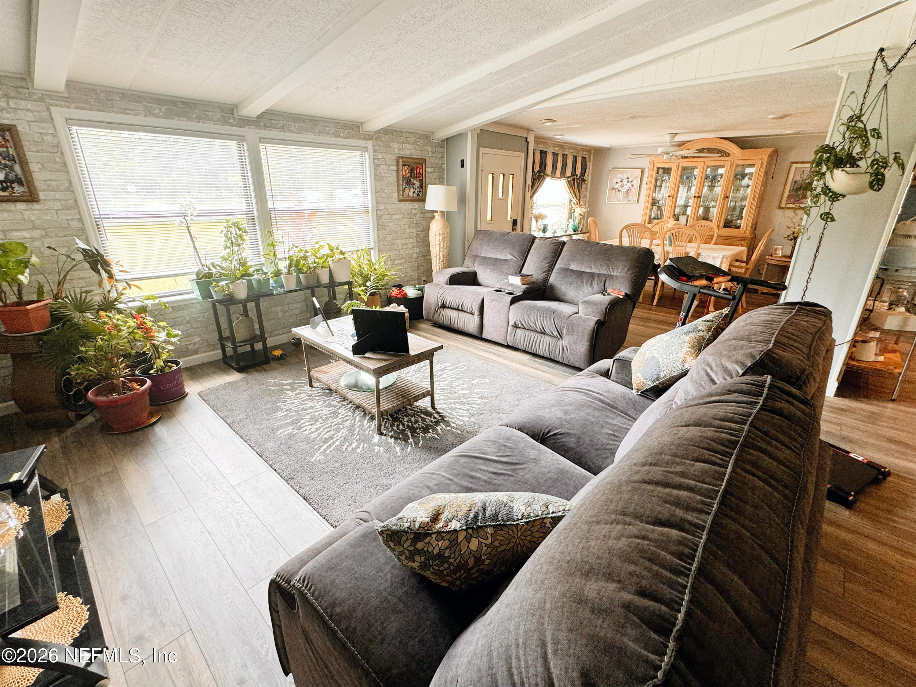 140 Keystone Road Palatka, FL 32177 - Photo 5 of 19 a living room with furniture and a large window