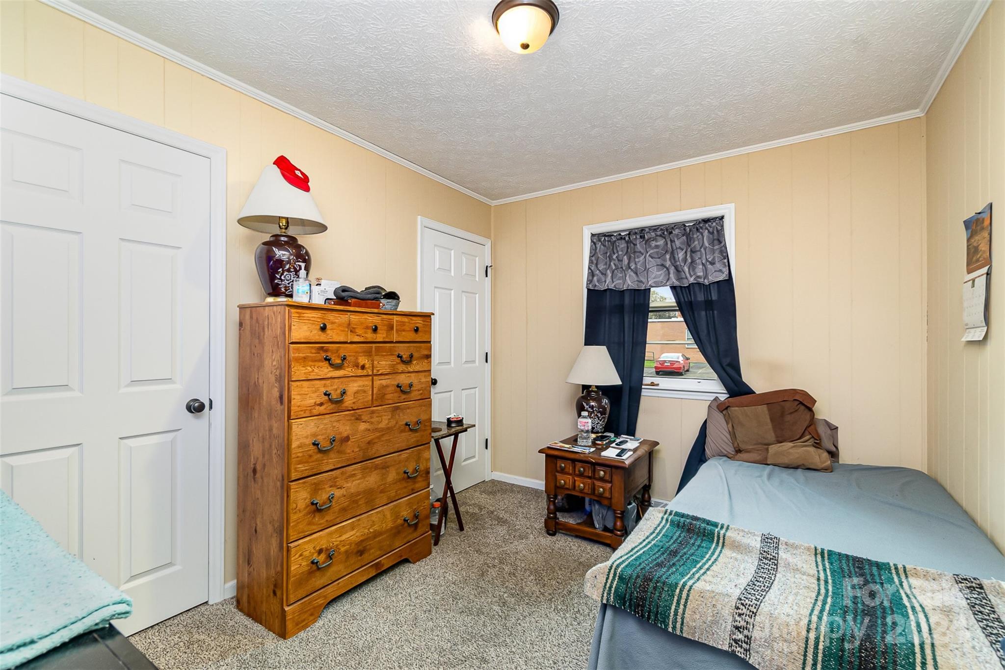 501 Weaver Street Cherryville, NC 28021 - Photo 17 of 26 a bedroom with a bed and furniture